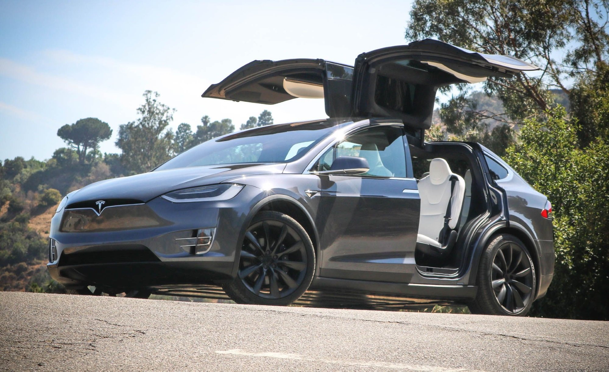 Tesla produces a crossover with an electric motor