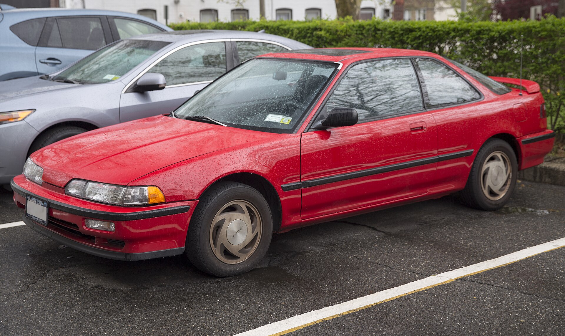 Red 1990 Acura Integra GS three-door liftback, front left view