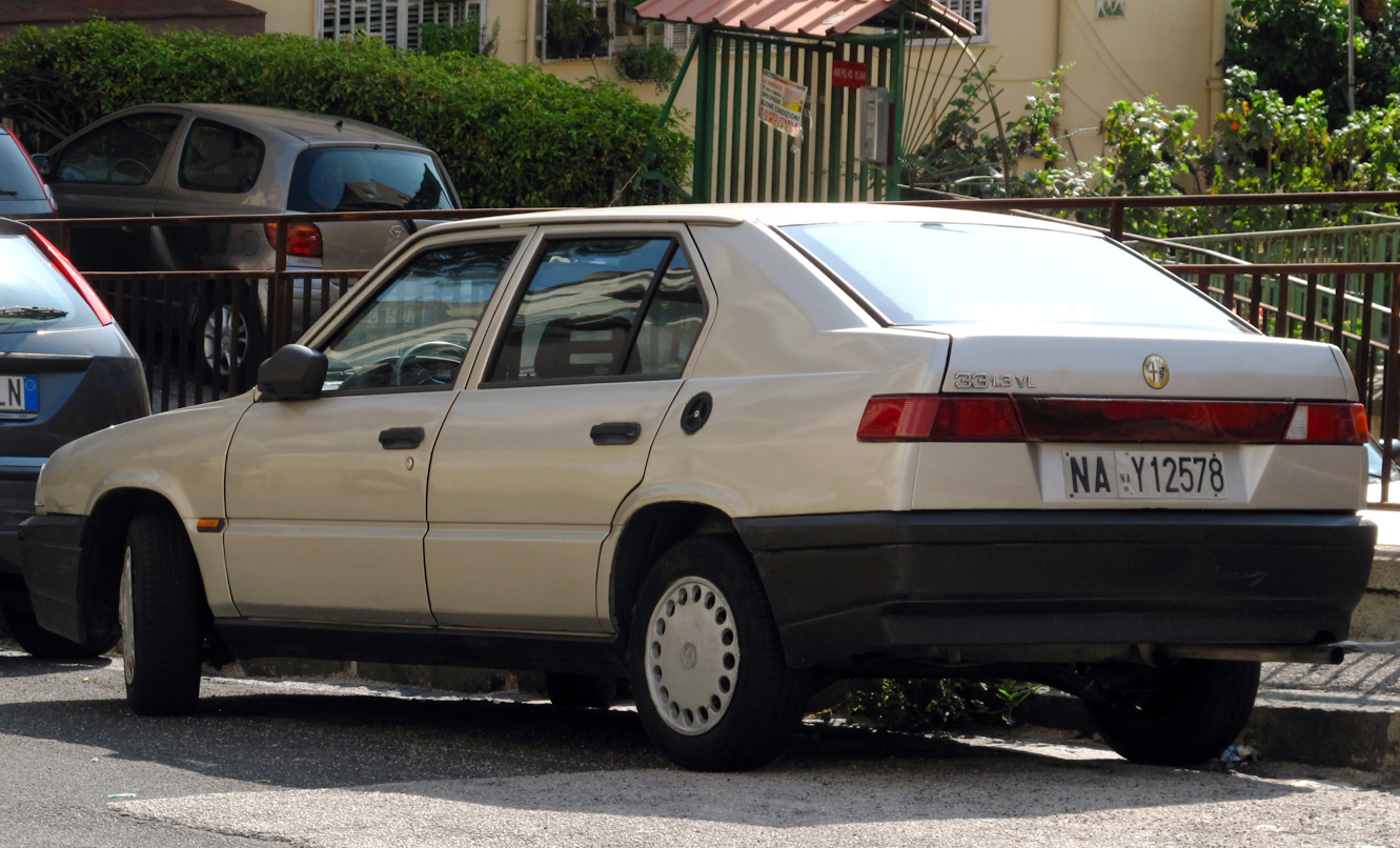 Silver Alfa Romeo 33 Series II, rear left view