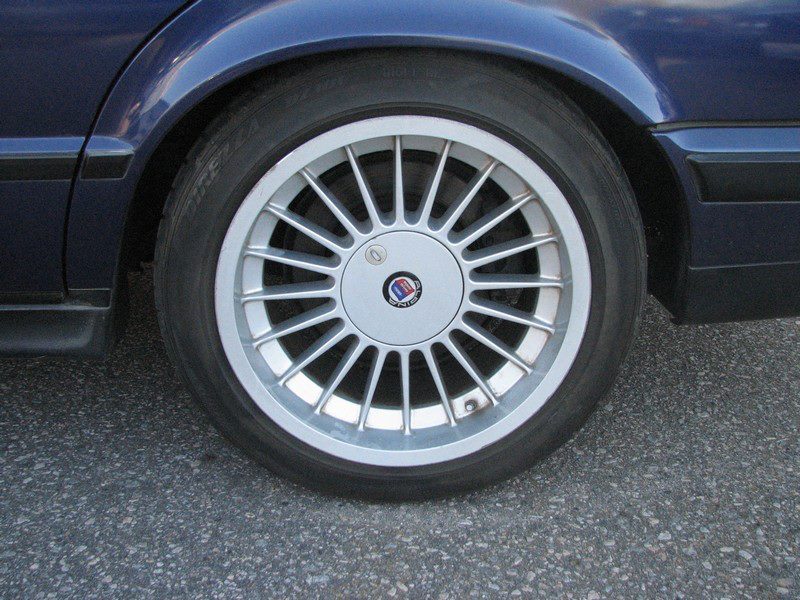 Close-up of an Alpina multi-spoke alloy wheel