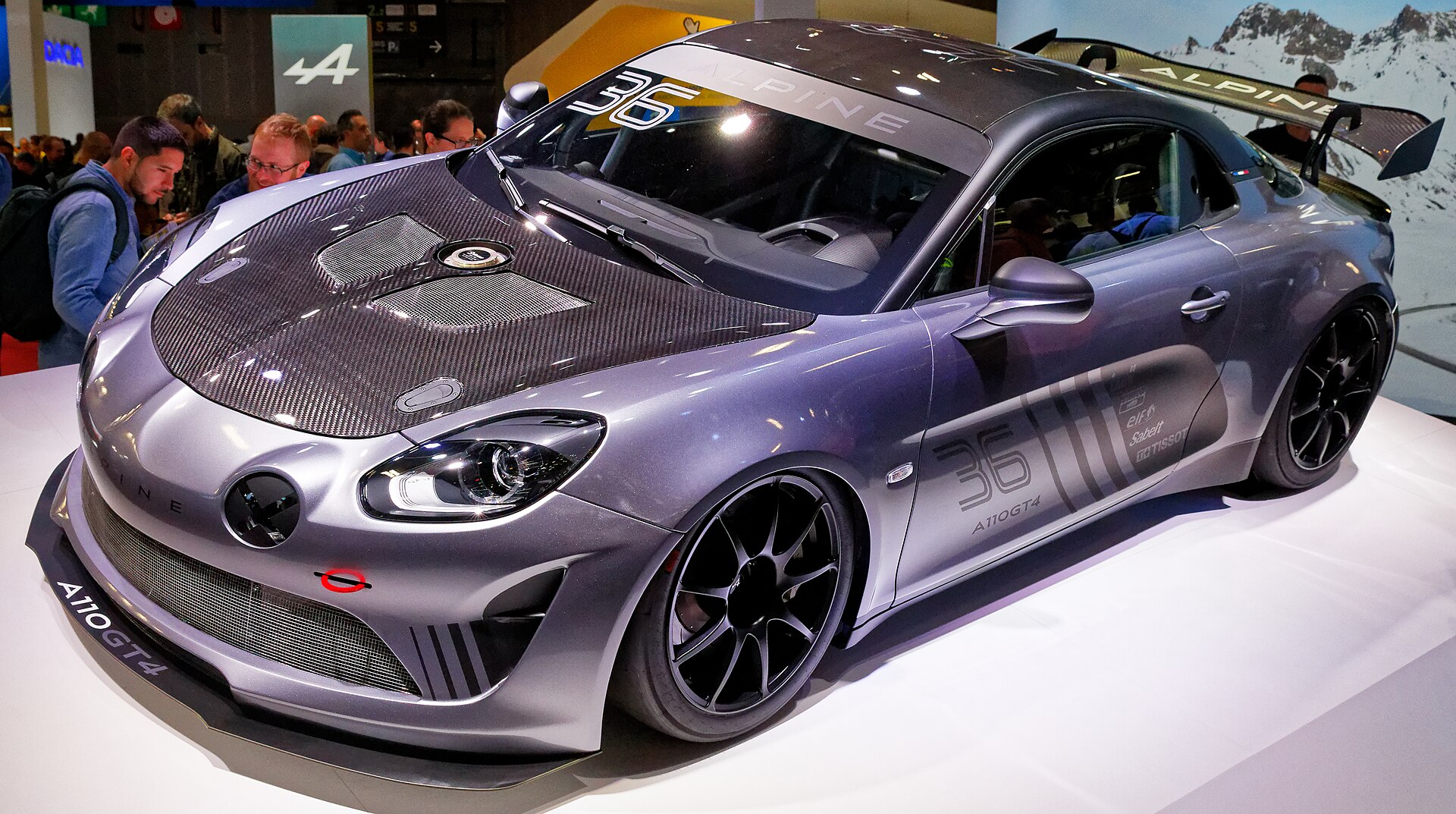 Alpine A110 GT4 race car with a rear wing