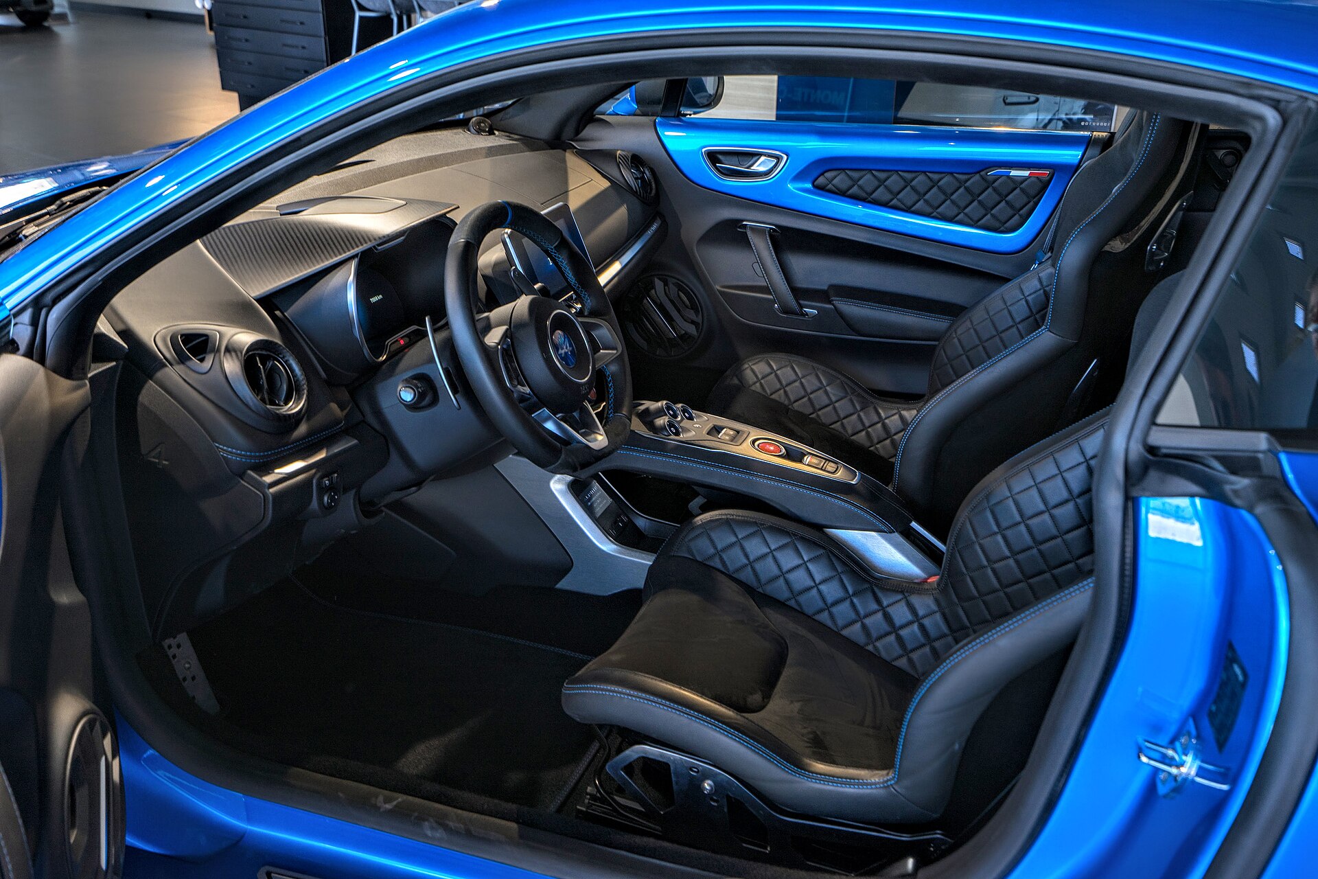 Alpine A110 interior with two seats and dashboard