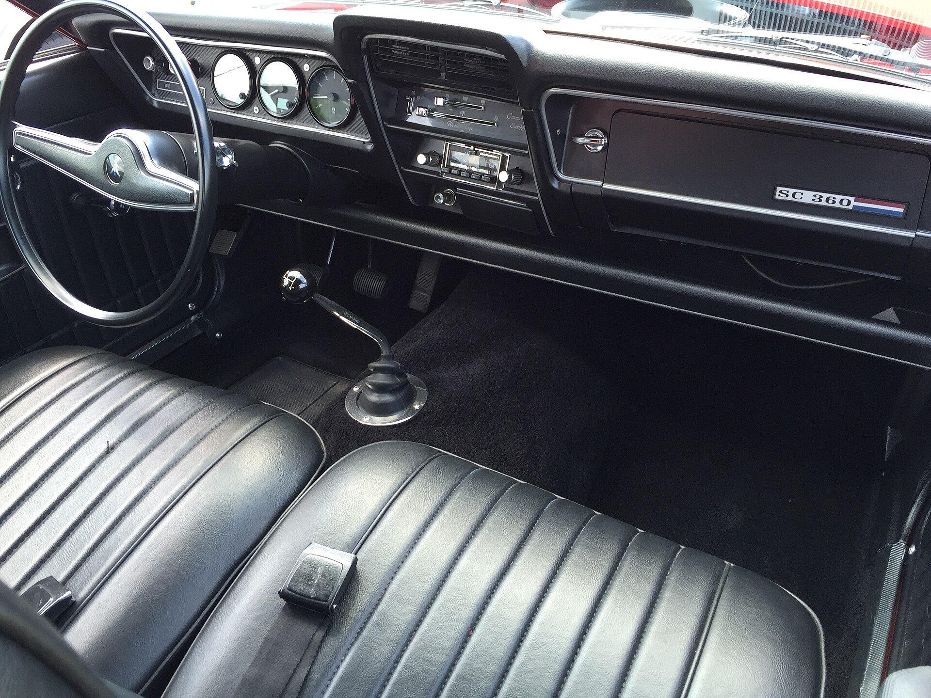 Red 1971 AMC Hornet SC/360 at a car show
