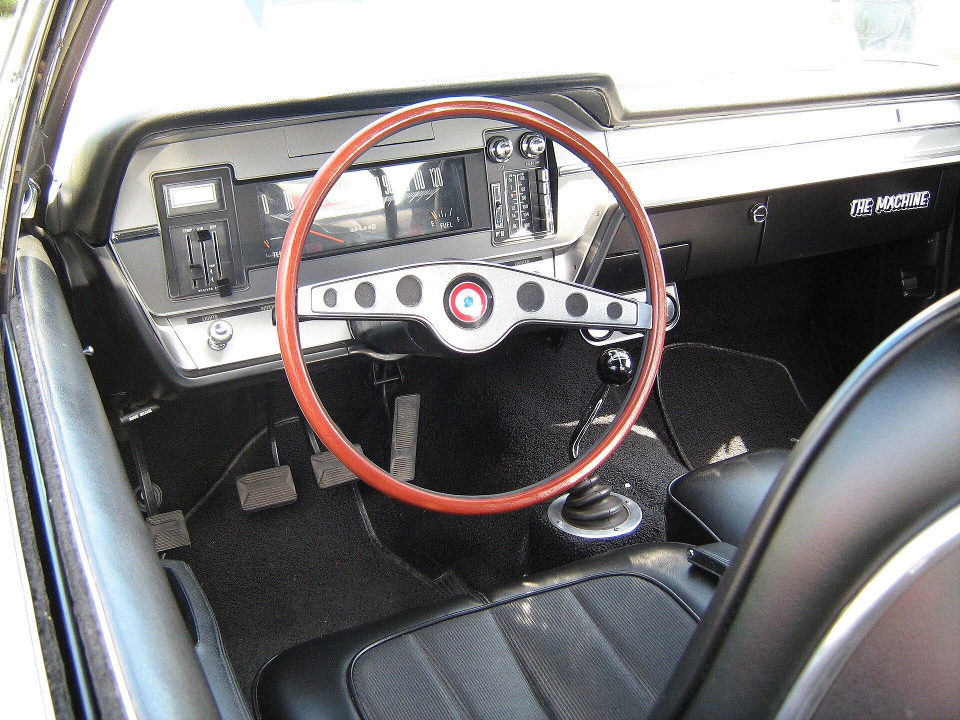 Hood scoop of the AMC Rebel Machine with the tachometer