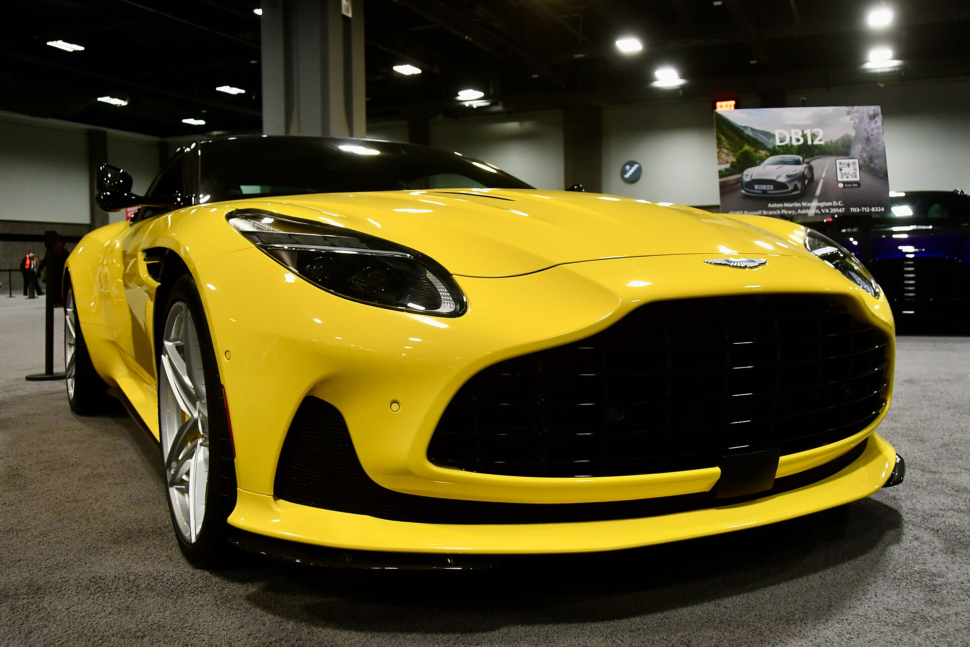 Yellow Aston Martin DB12 coupé