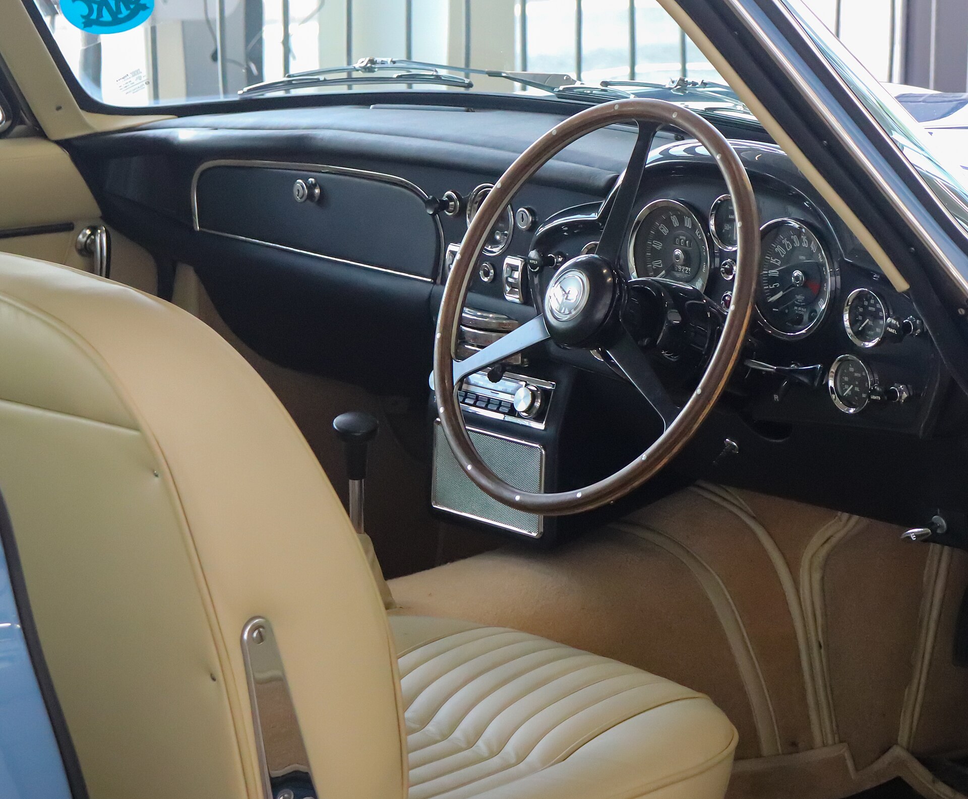Aston Martin DB6 interior with dashboard and seats