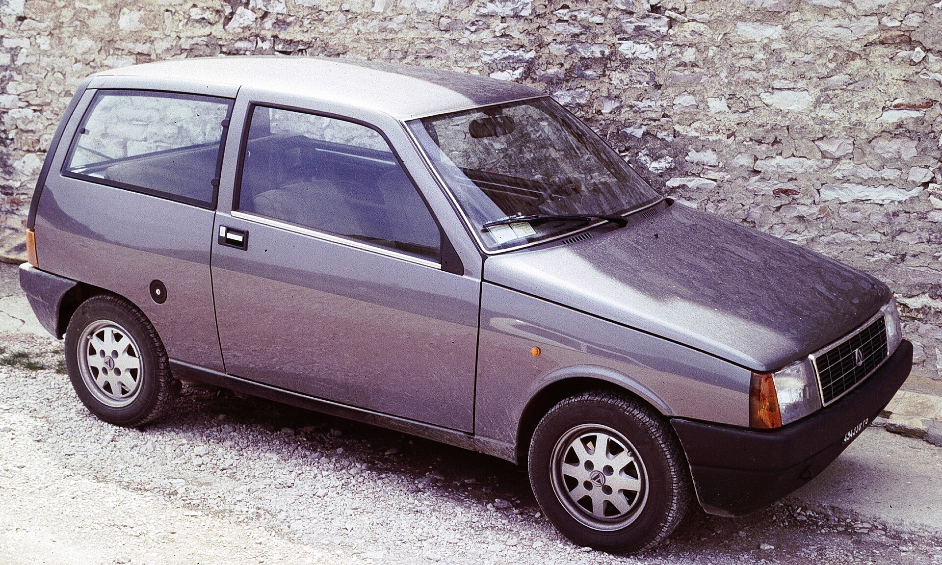 Autobianchi Y10 small hatchback parked in Rome
