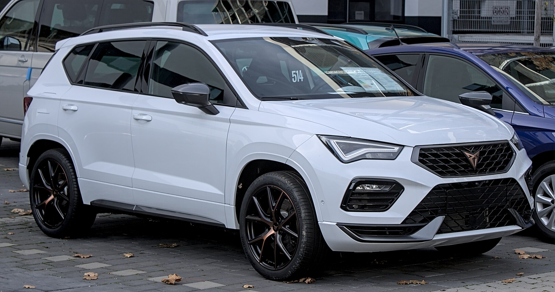 Grey Cupra Ateca SUV with copper details, front view