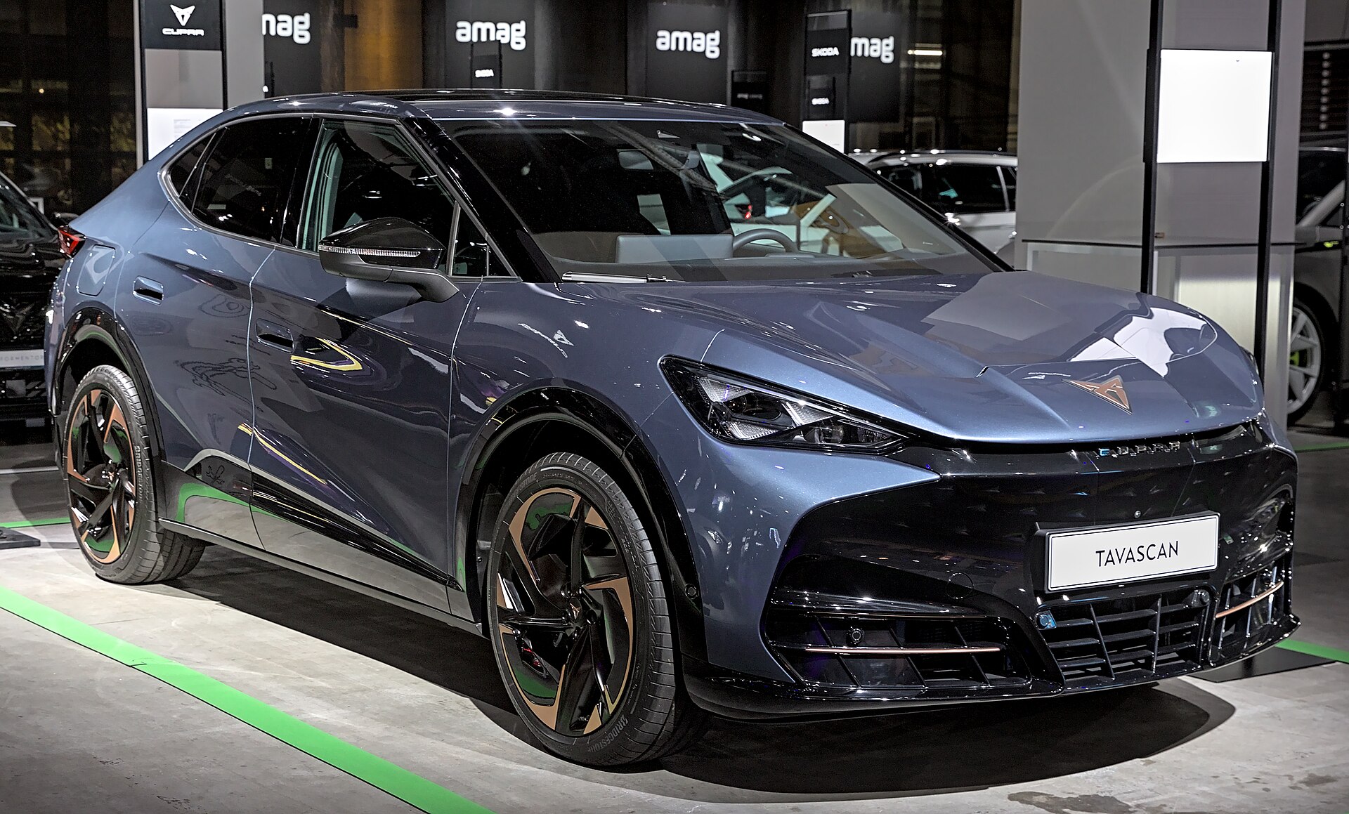 Cupra Tavascan electric SUV coupé on a show stand in Zurich in 2023