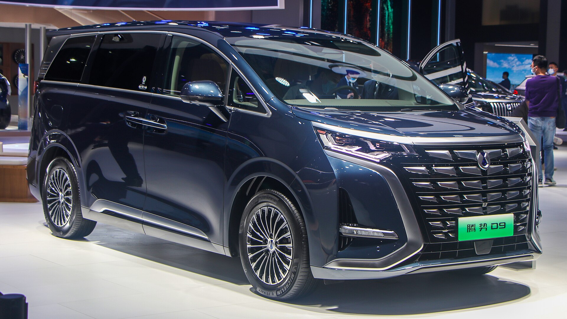 Denza D9 MPV on a motor show stand