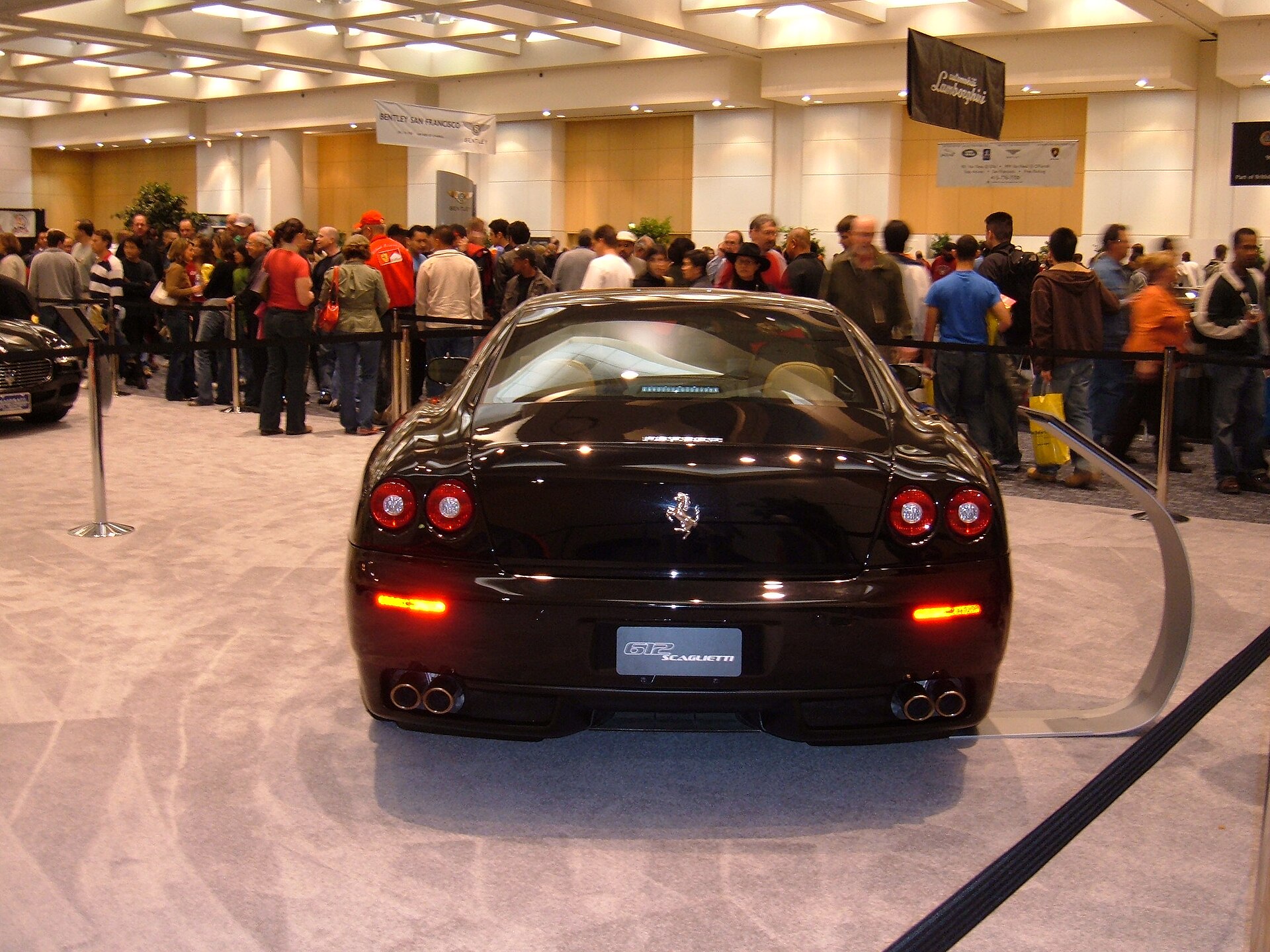Black 2005 Ferrari 612 Scaglietti rear three-quarter view