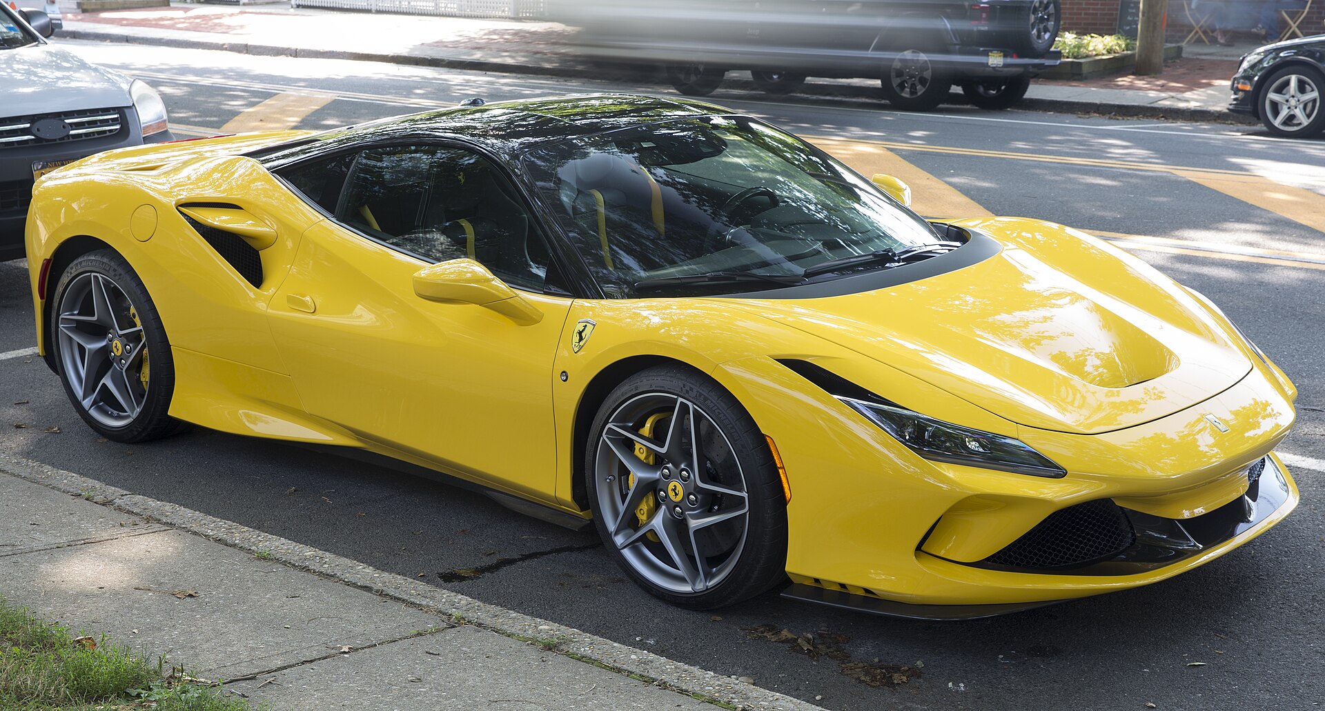 Yellow Ferrari F8 Tributo, front right view