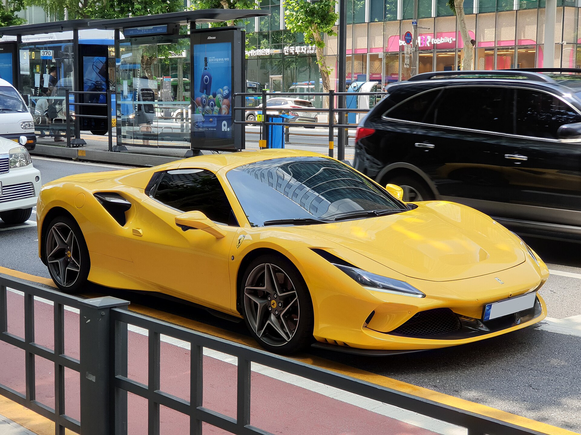 Yellow Ferrari F8 Spider convertible