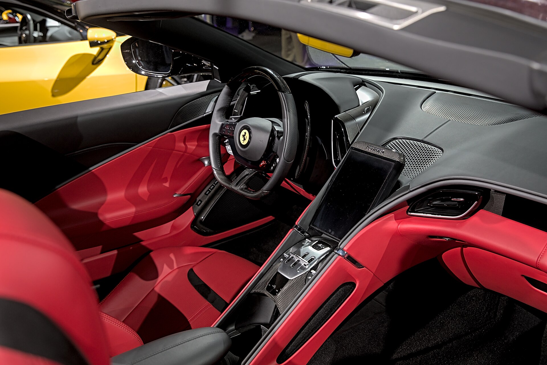 Ferrari Roma Spider with fabric roof, at a motor show