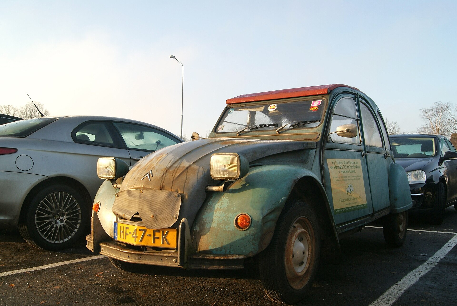 Classic Citroen 2CV 6 Club parked outdoors