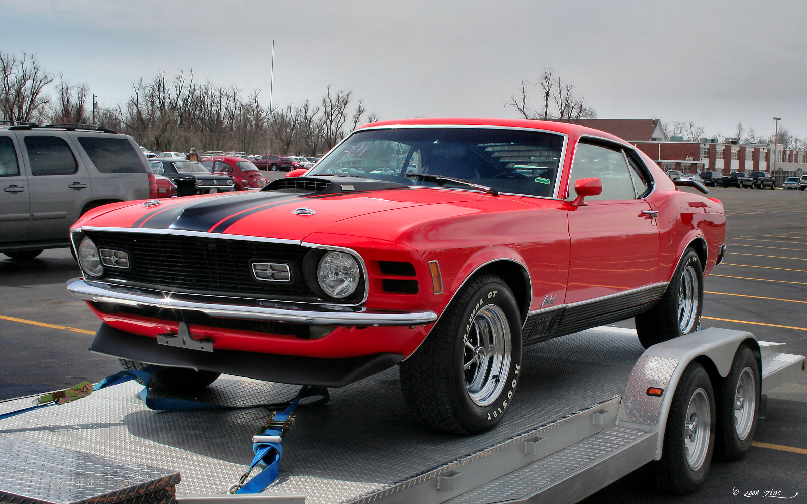 Red 1970 Ford Mustang Mach 1, front left view