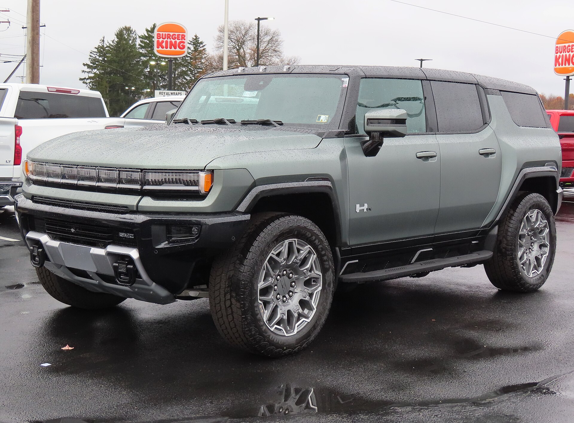 Grey GMC Hummer EV SUV, front left view