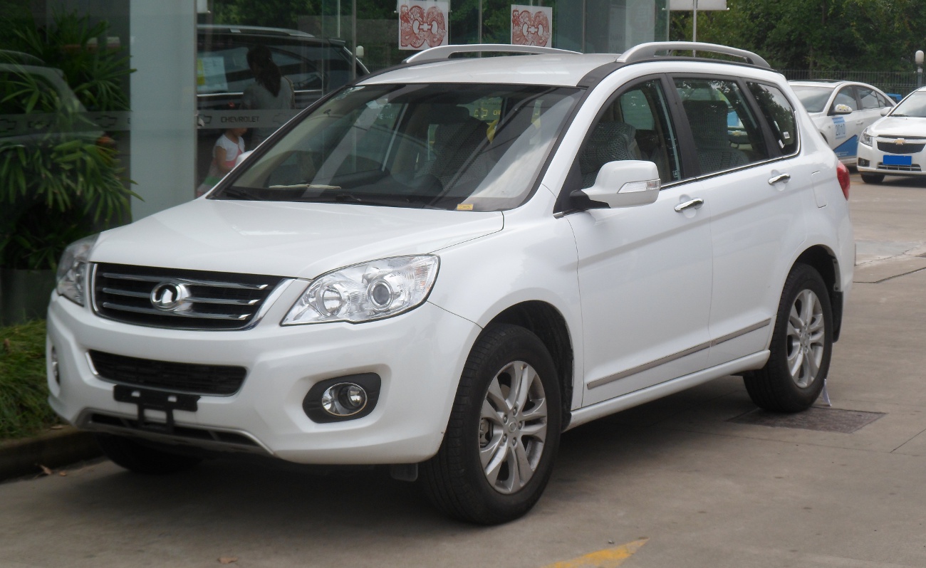 White first-generation Great Wall Haval H6 SUV in a car park in China