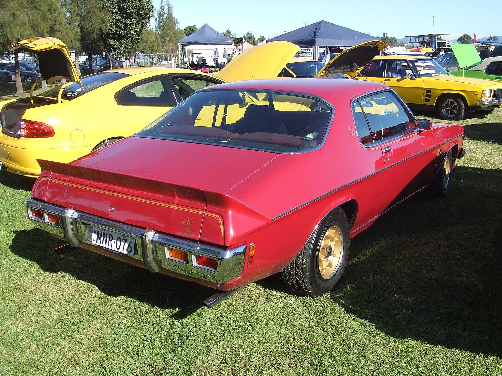 Red Holden HX Limited Edition coupé with honeycomb wheels