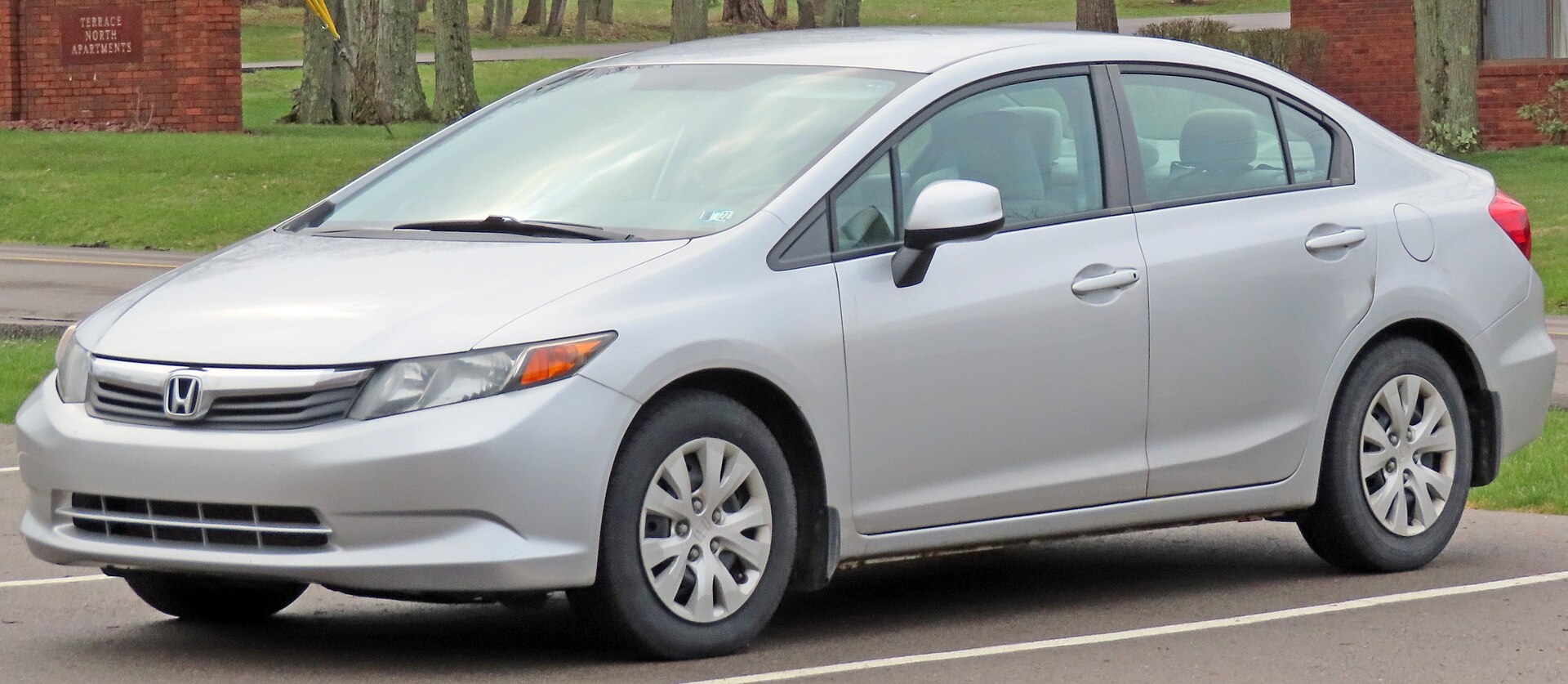 Honda Civic LX saloon of 2012, front three-quarter view