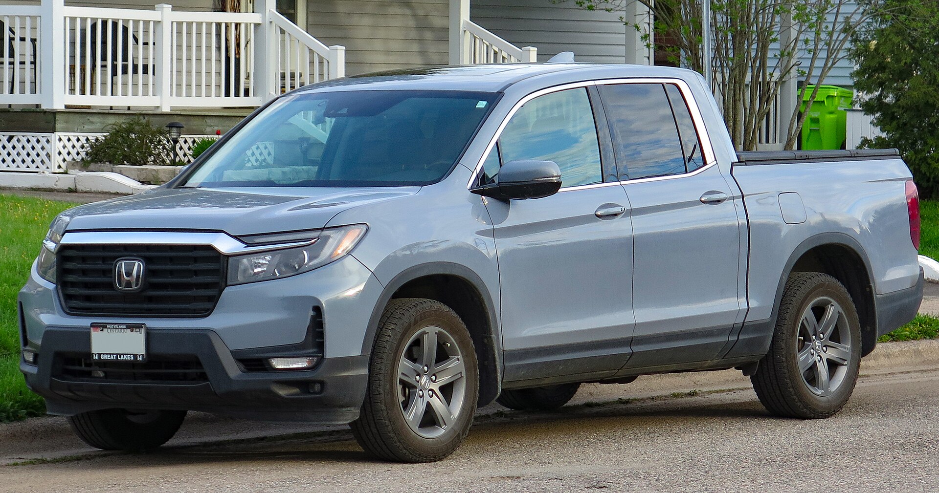 Grey Honda Ridgeline Touring pickup, front three-quarter view