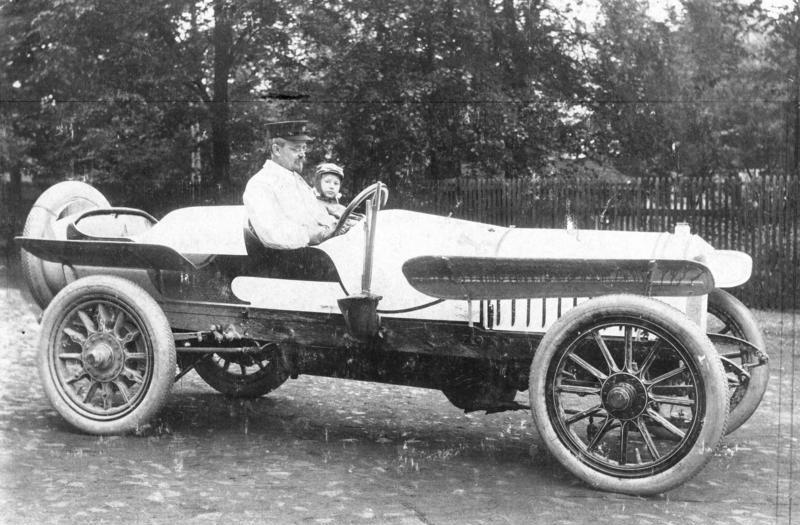 Historic photo of August Horch at the wheel of a Horch