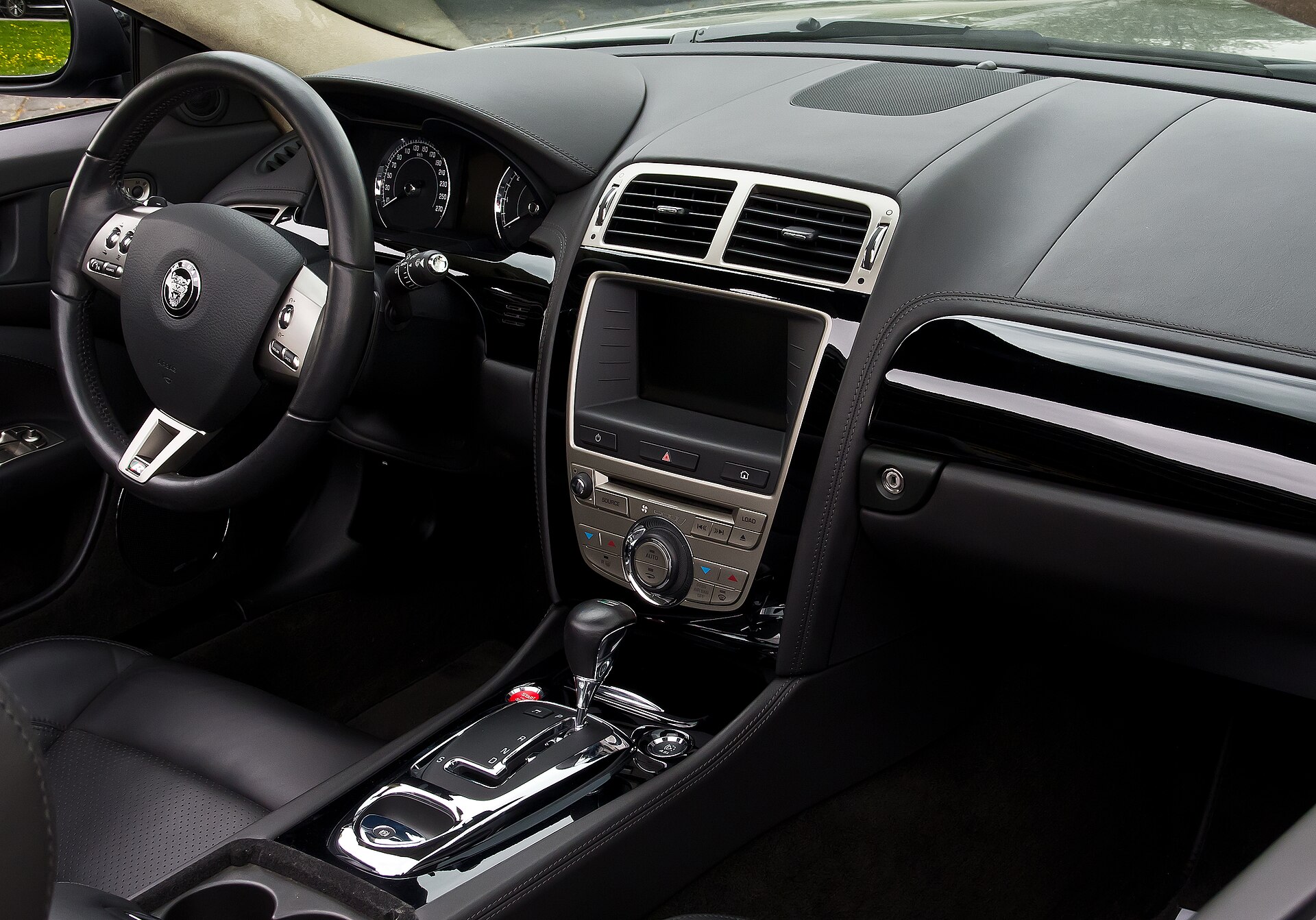 Jaguar XKR X150 interior with dashboard and seats
