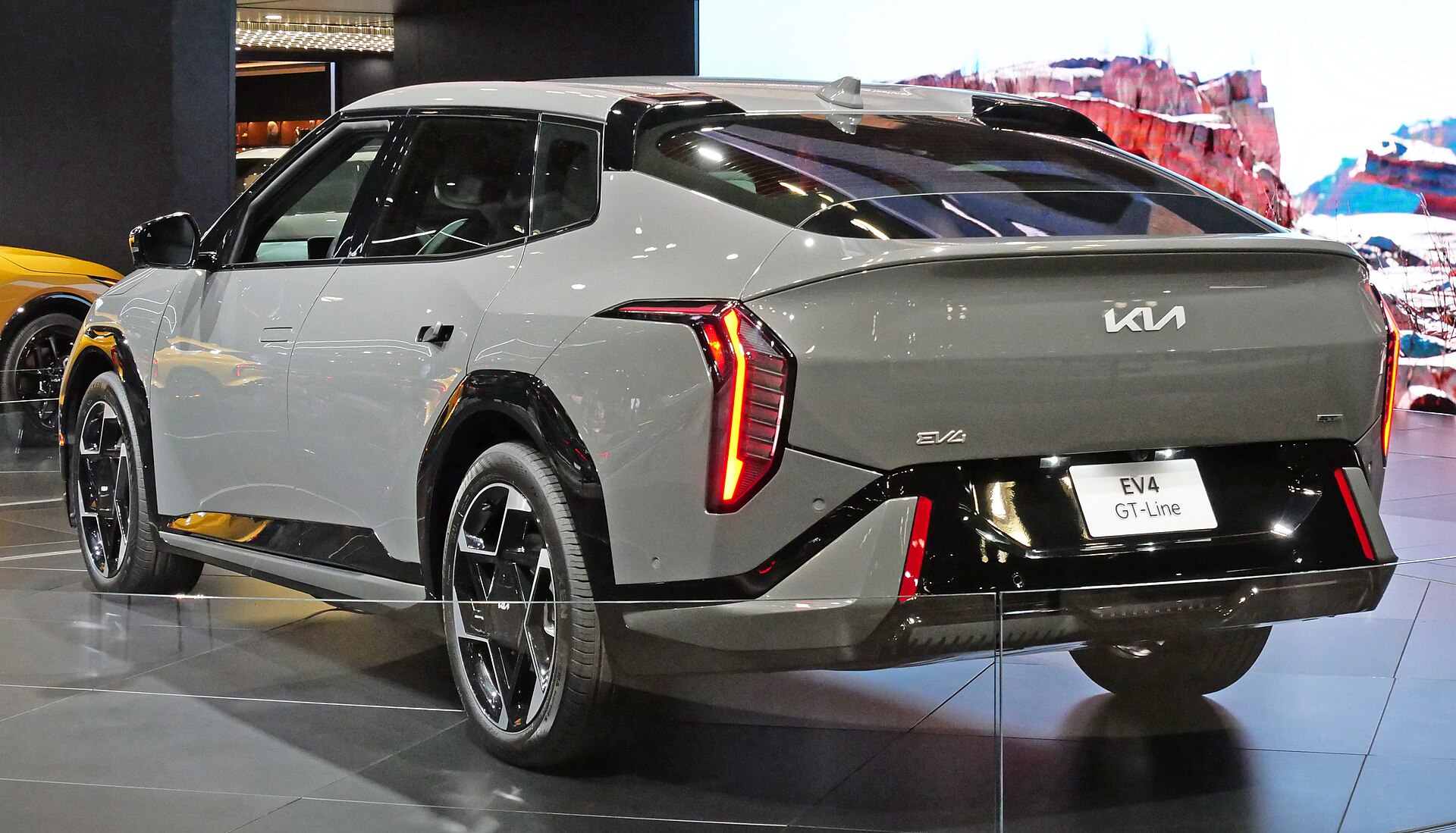 Kia EV4 saloon, rear three-quarter view