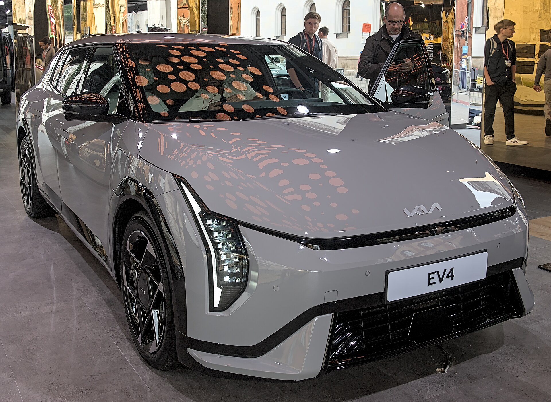 Kia EV4 hatchback, side and rear view