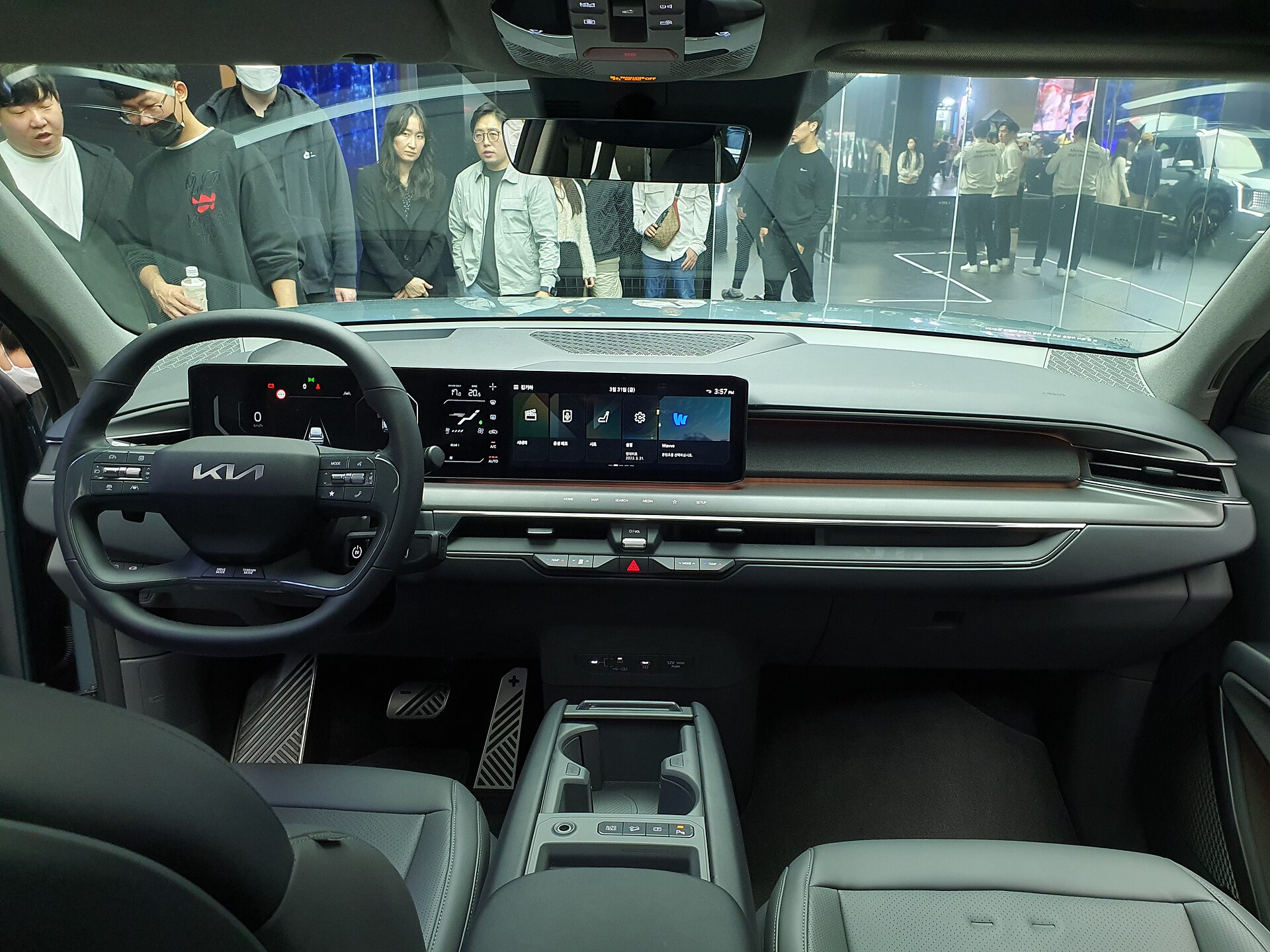 Kia EV9 interior with wide dashboard screens