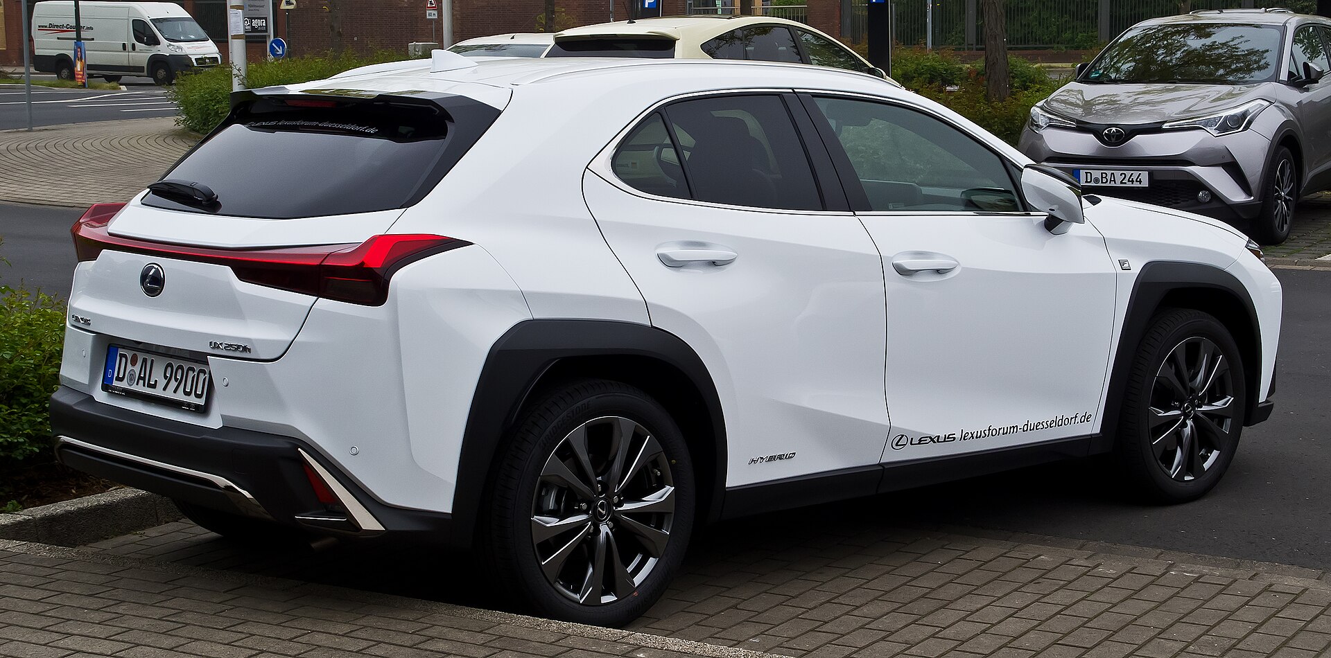 Lexus UX 250h F Sport, rear three-quarter view