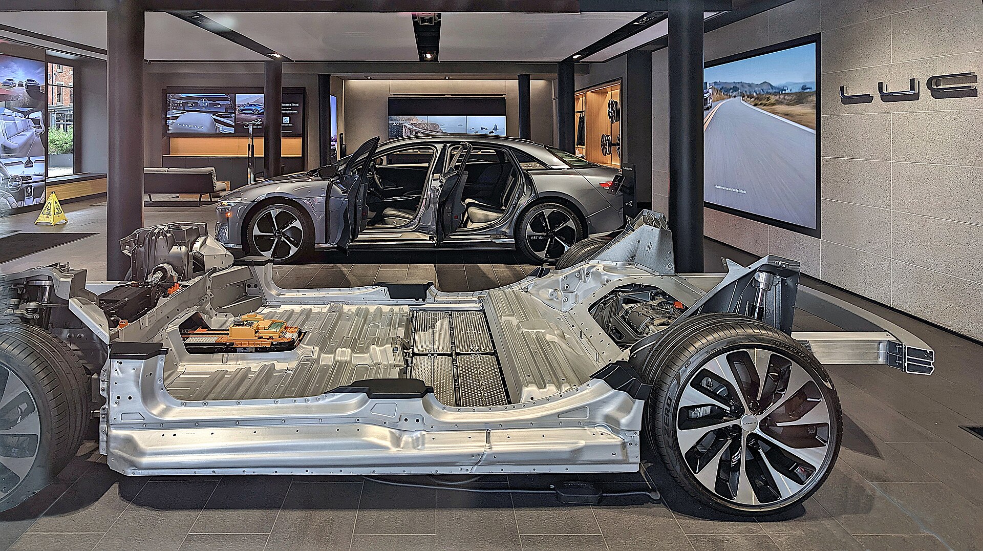 Bare Lucid Air chassis showing the battery and rear structure