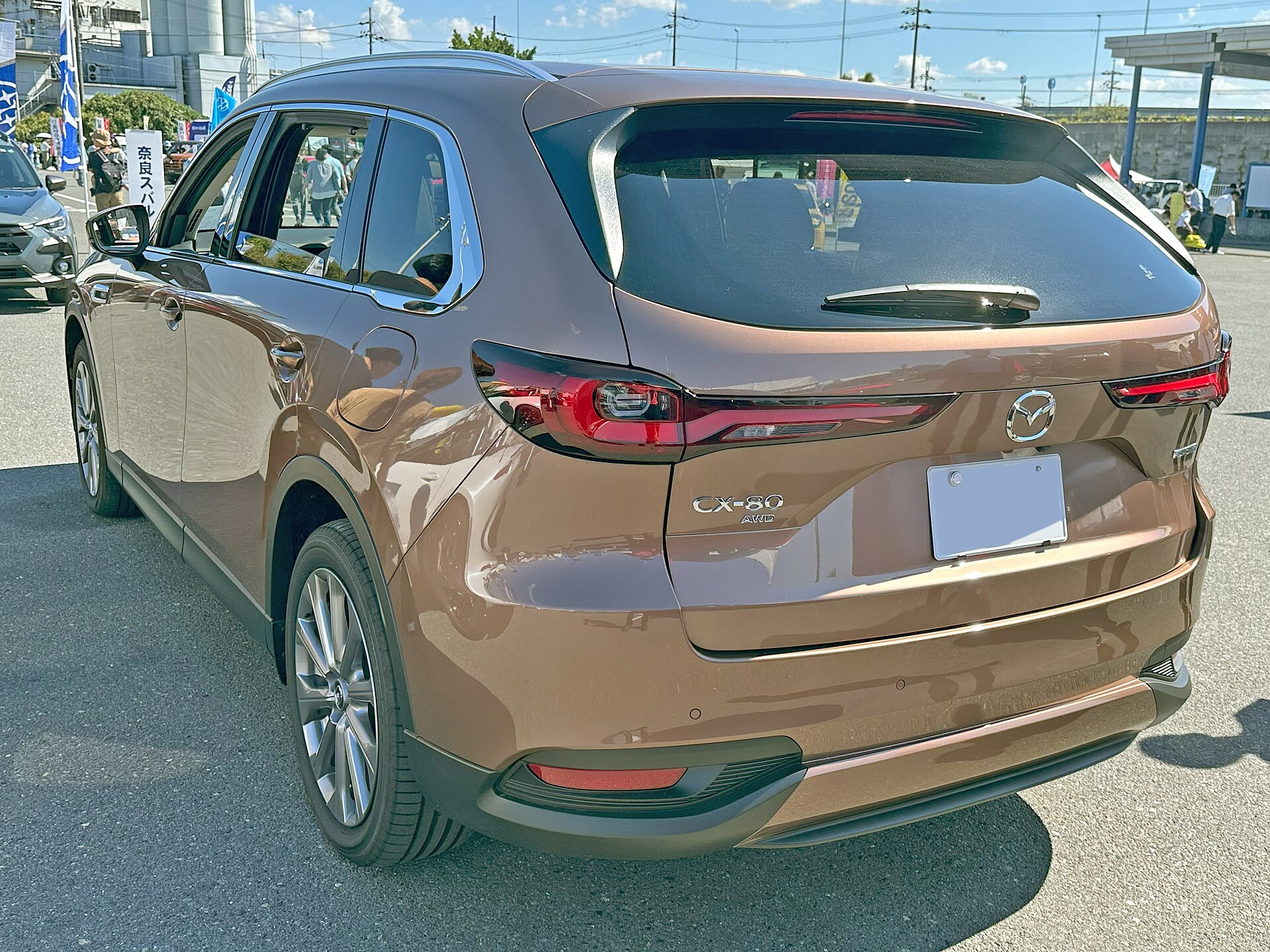 Mazda CX-80 plug-in hybrid, rear three-quarter view
