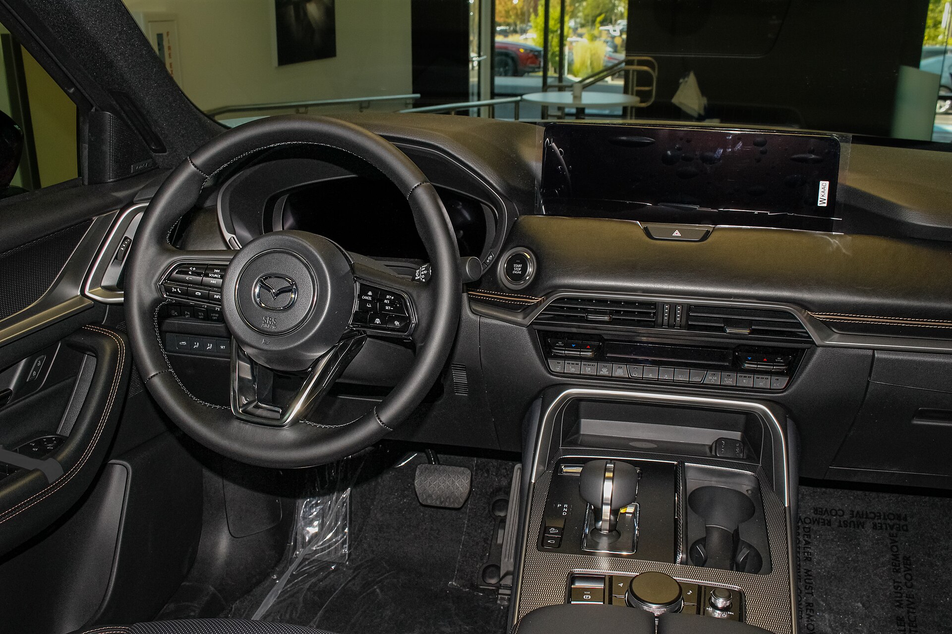 Interior and dashboard of a Mazda CX-70