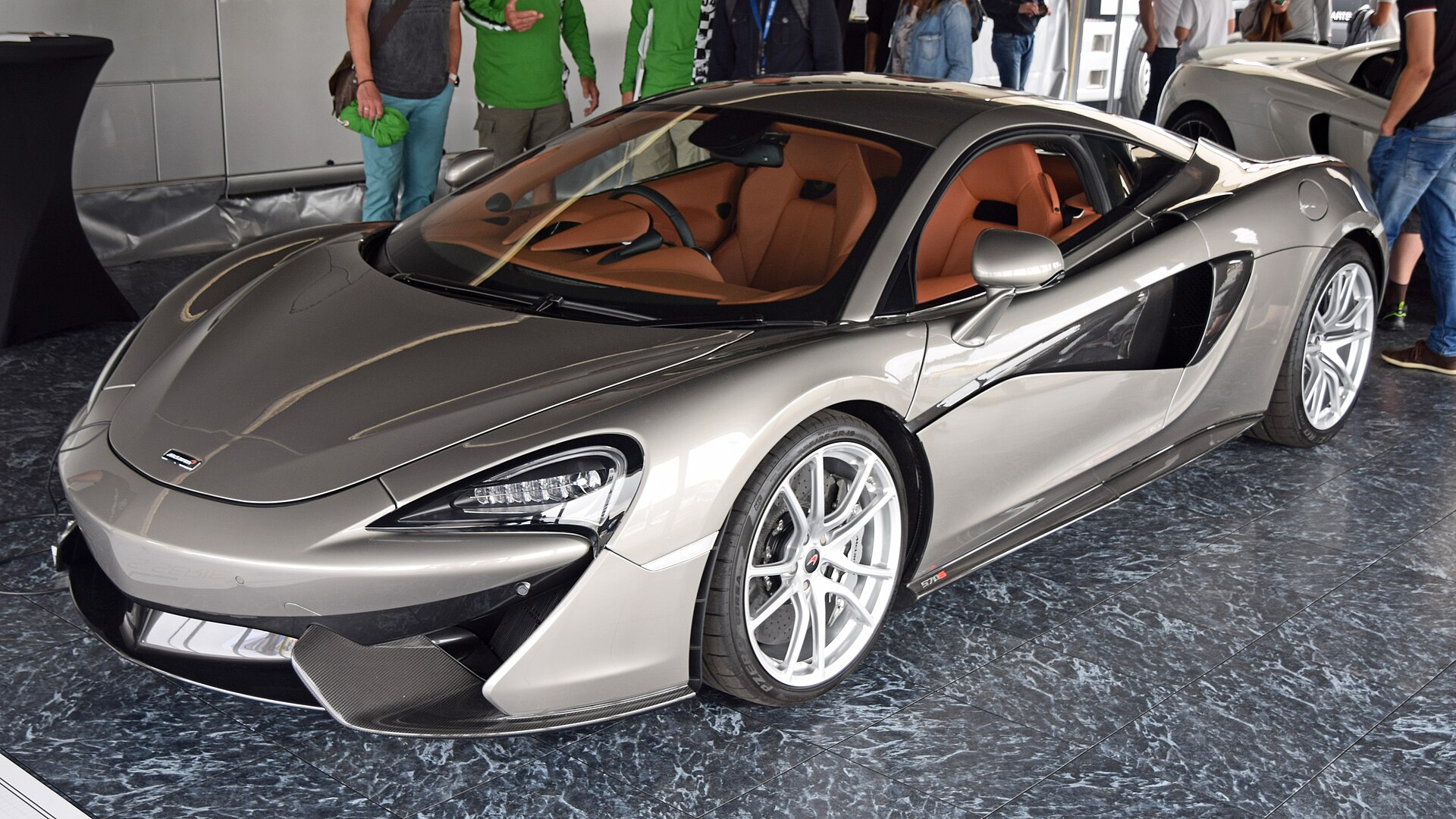 McLaren 570S side view with dihedral doors