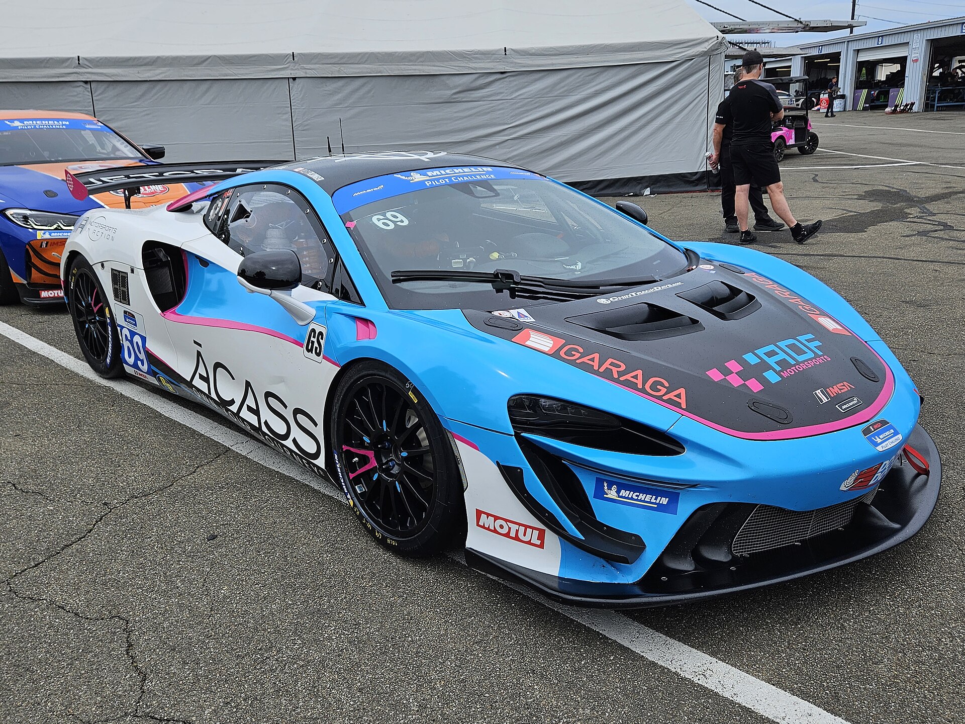 McLaren race car on track at Watkins Glen