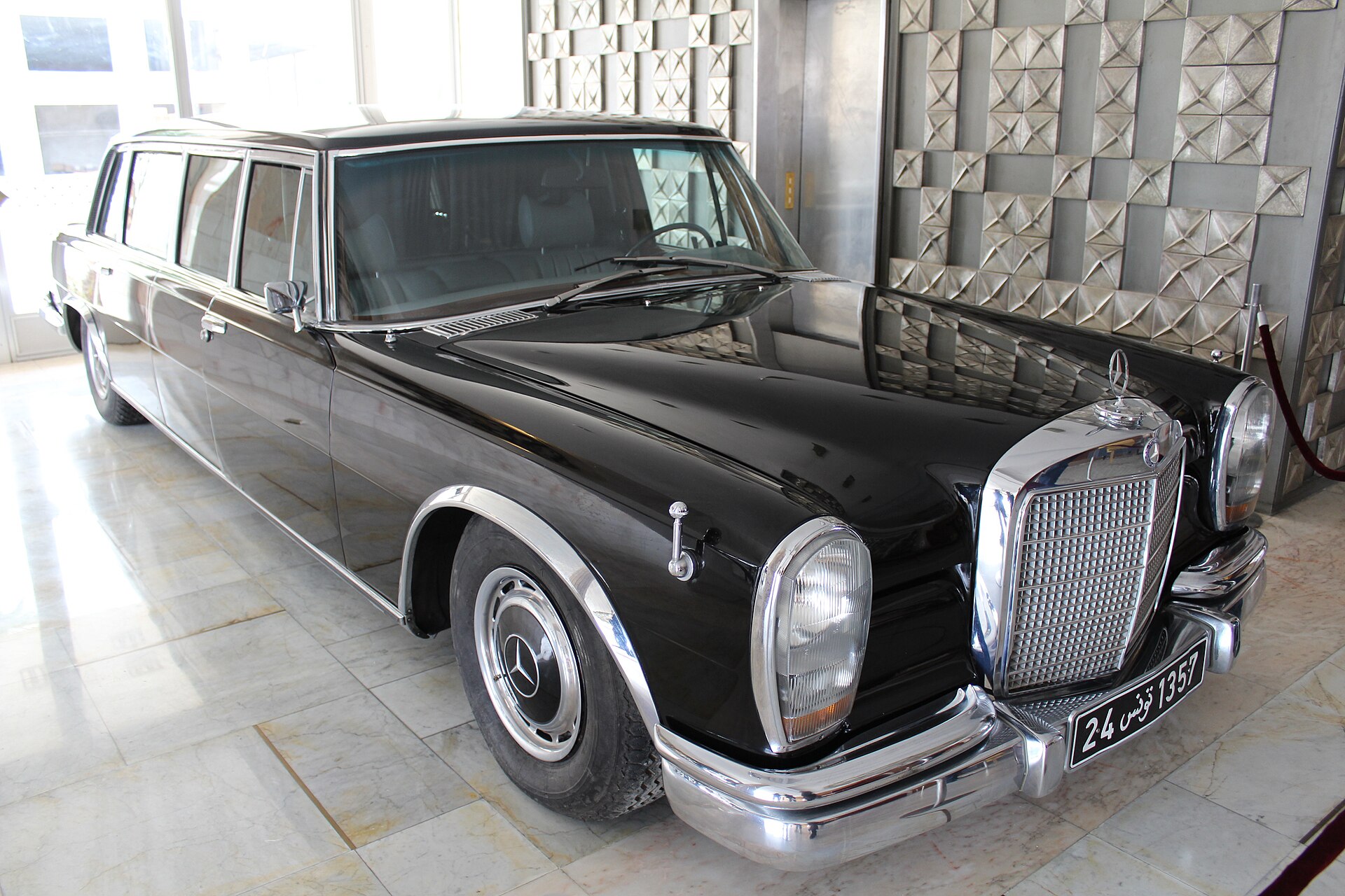 Black Mercedes-Benz 600 state car in a museum