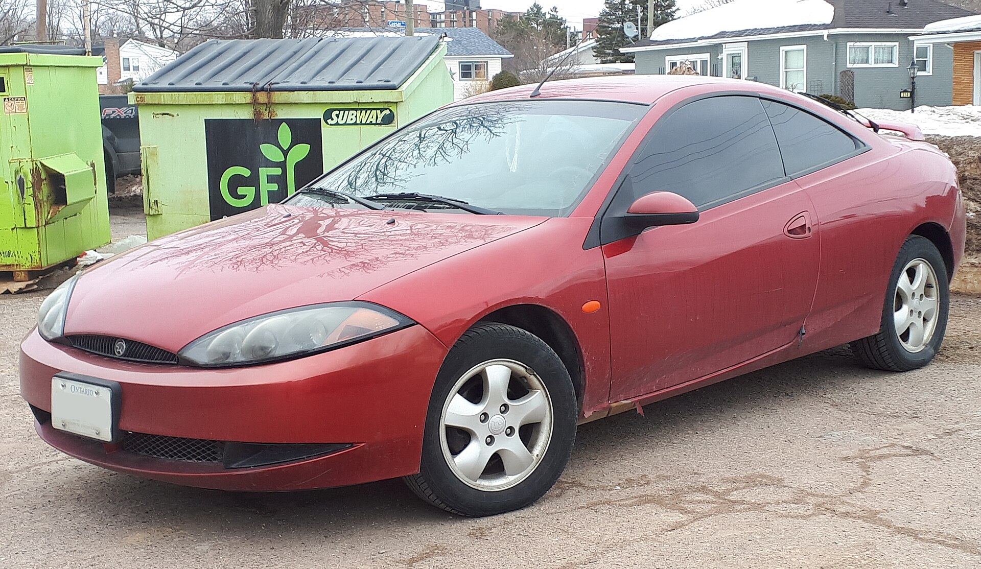 Red 2000 Mercury Cougar V6 three-door, front left view