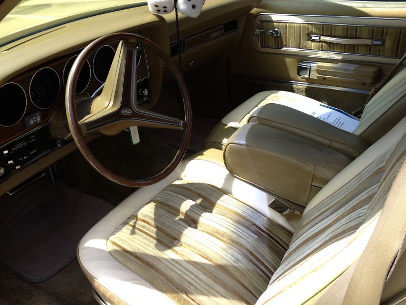 Front bench seat and dashboard of a 1974 Montego