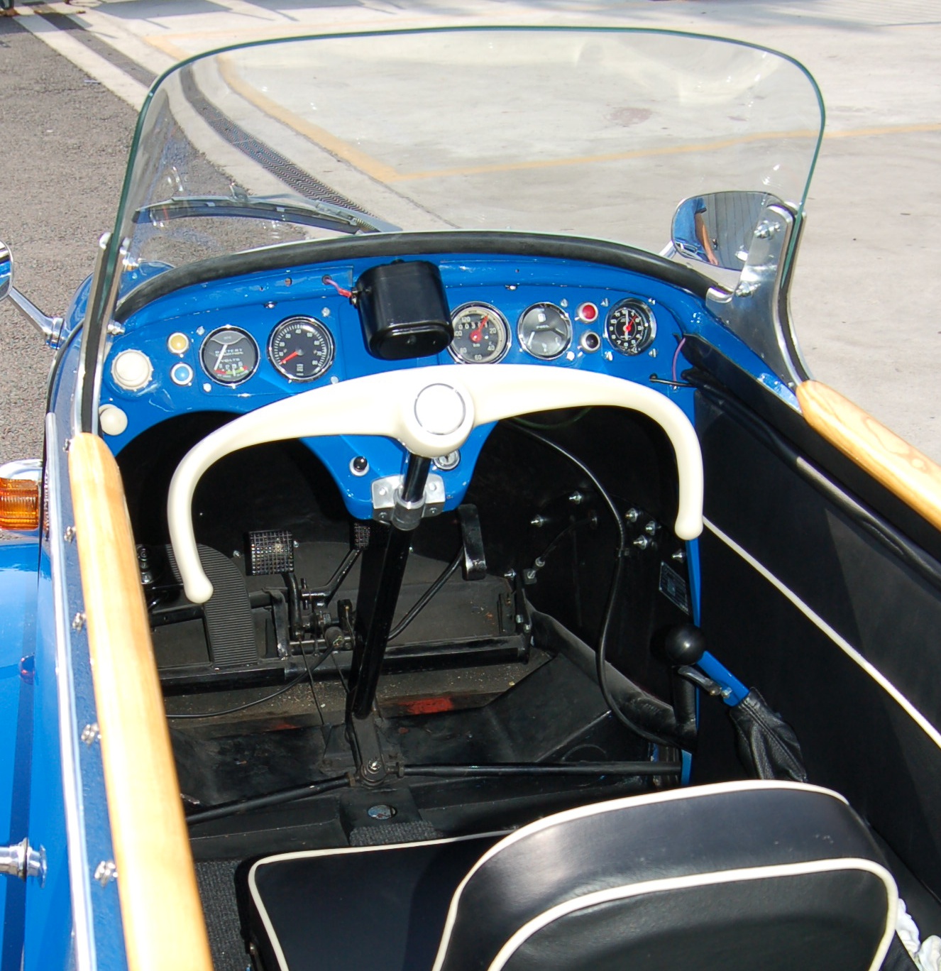Close-up of the steering bar and controls of a KR200