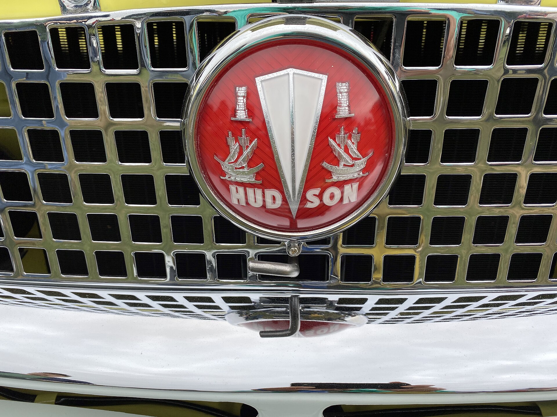 Yellow and white Hudson Metropolitan hardtop