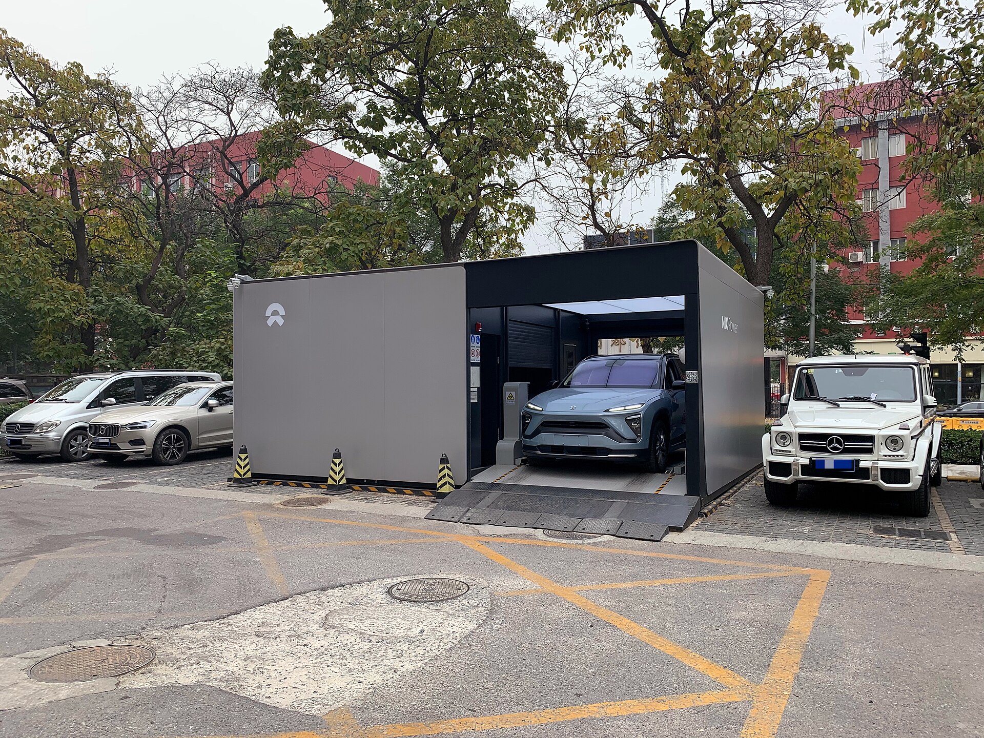 Nio battery swap station building with a car inside