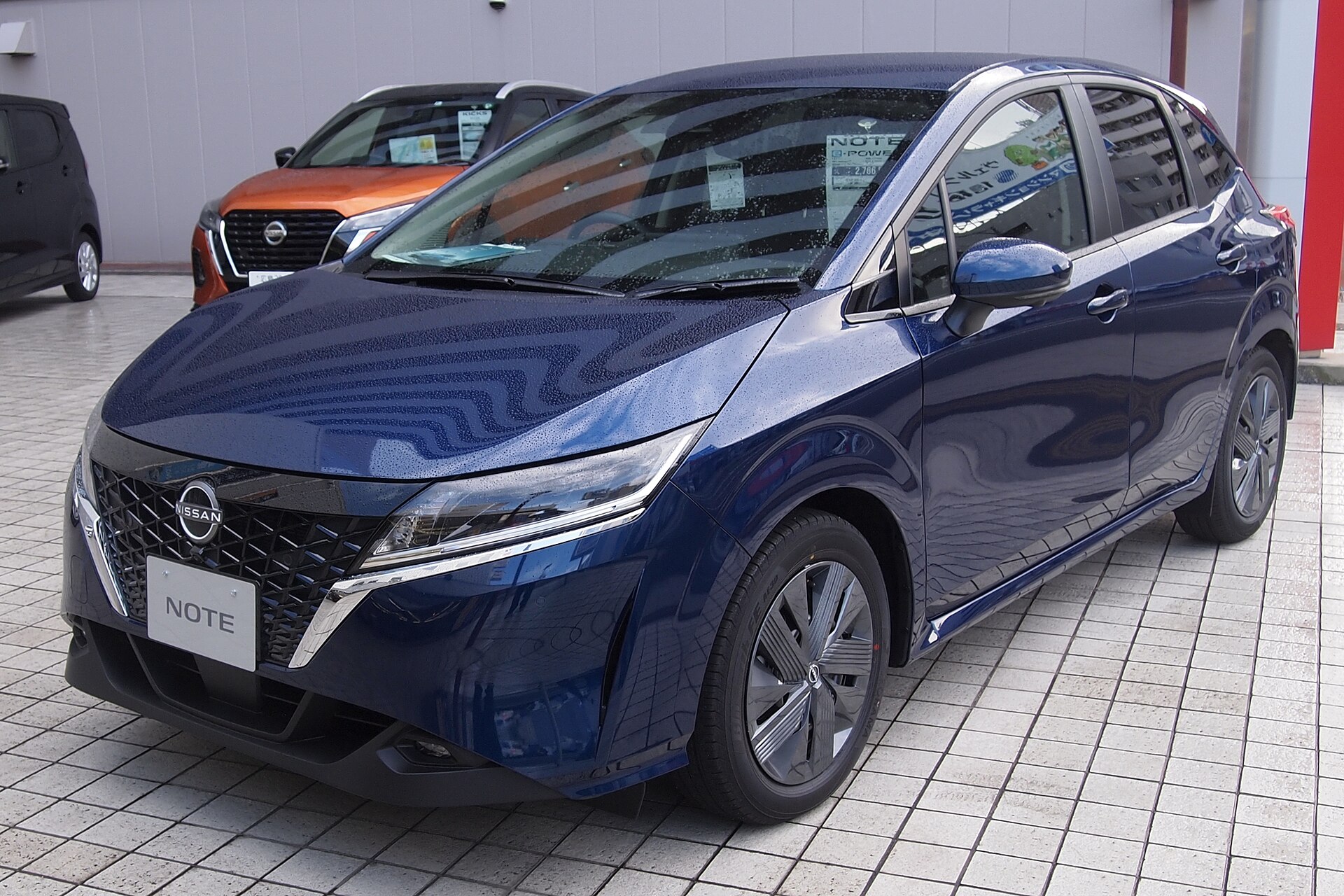 Nissan Note E13, front three-quarter view
