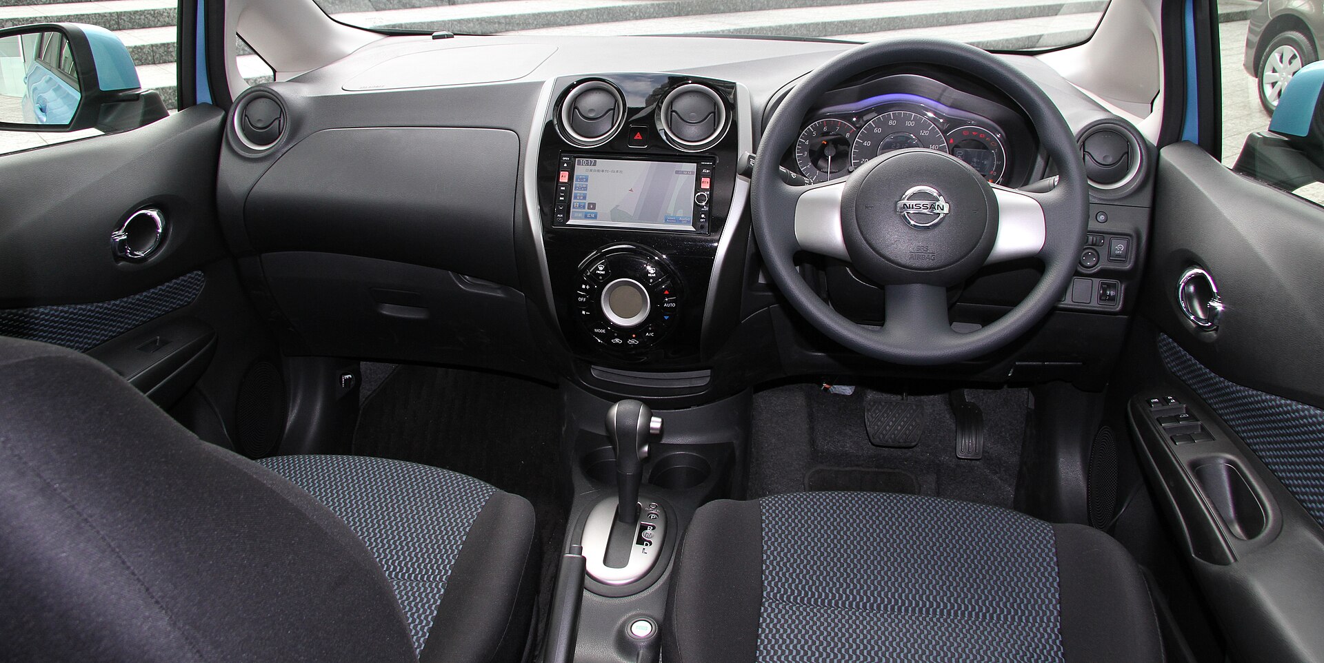Interior and dashboard of a Nissan Note E12