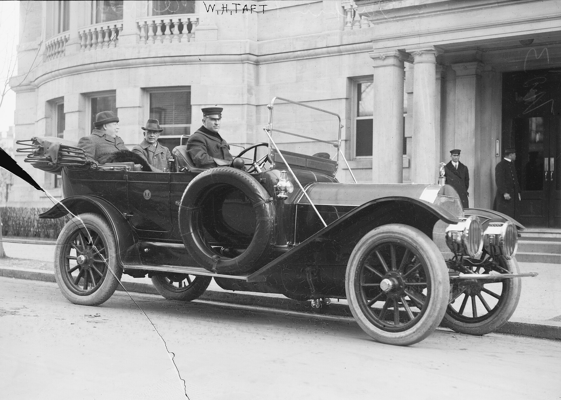 President Taft seated in an early motor car
