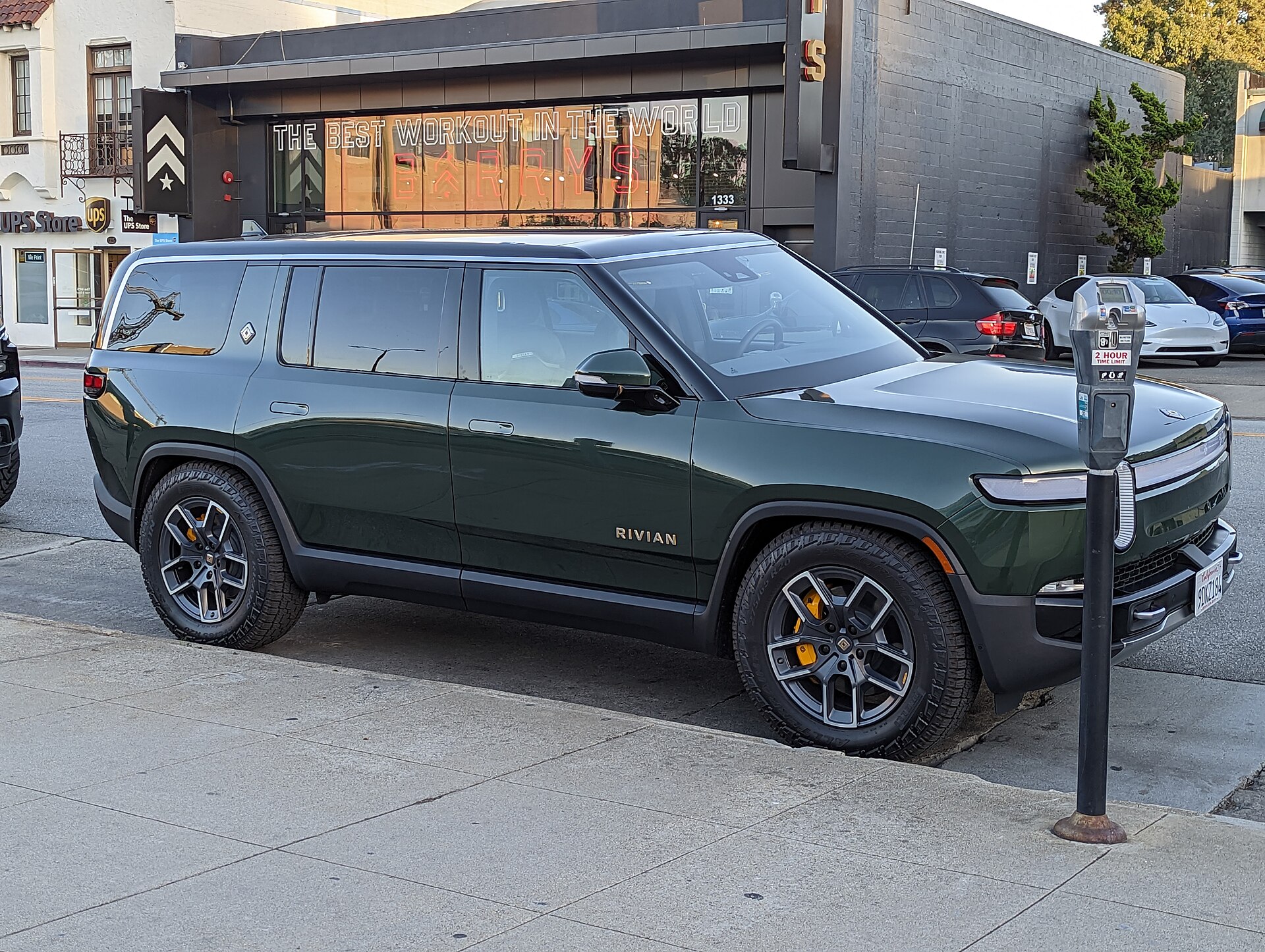 Rivian R1S electric SUV parked in a street