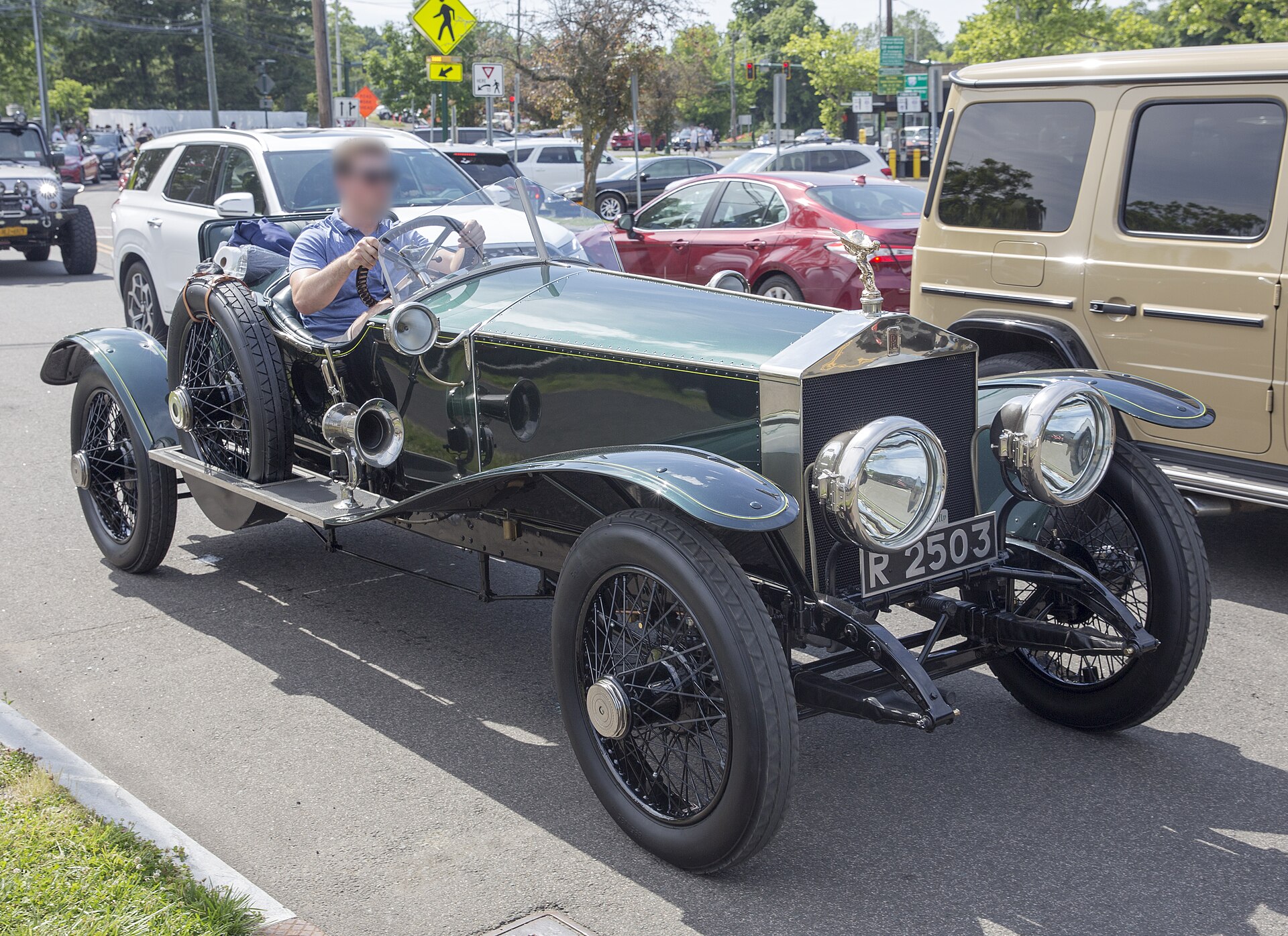 Green 1915 Rolls-Royce Silver Ghost skiff, front three-quarter view