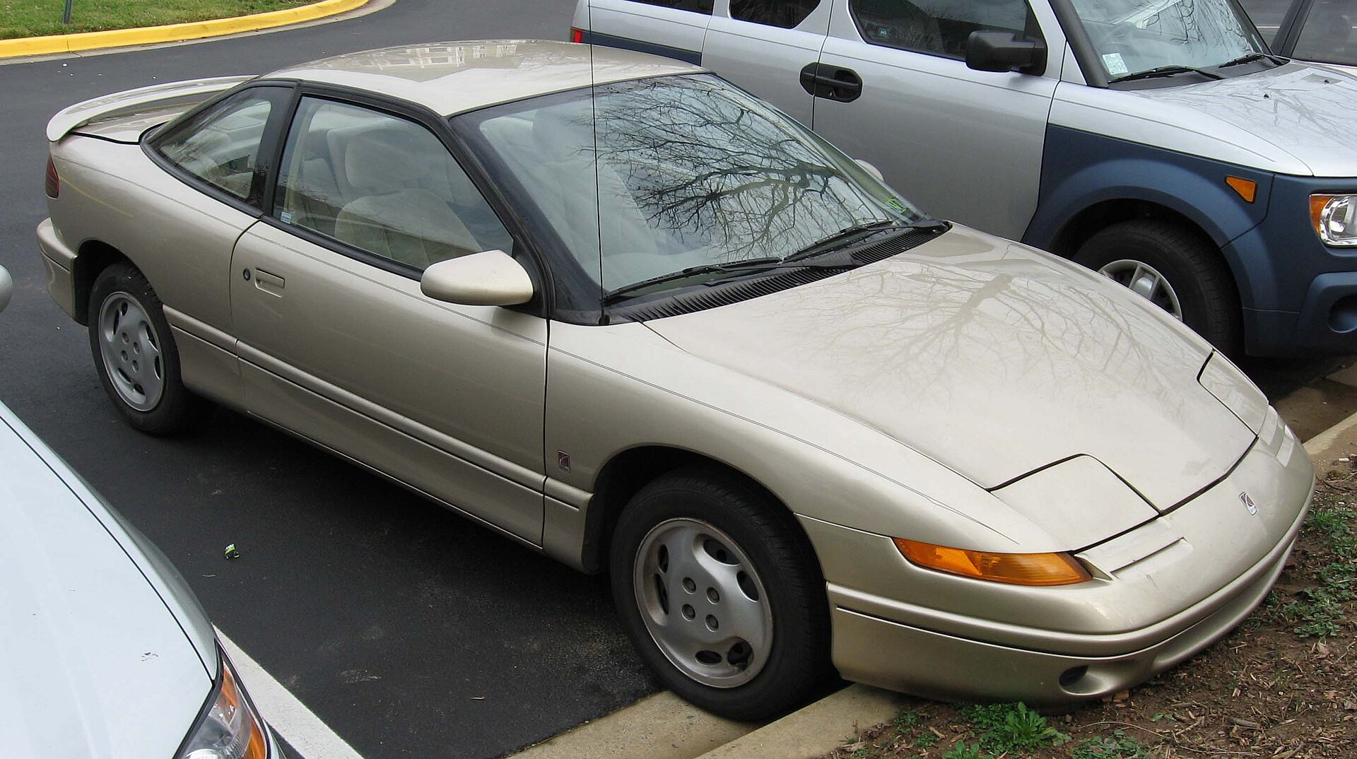 First-generation Saturn SC coupe with pop-up headlamps