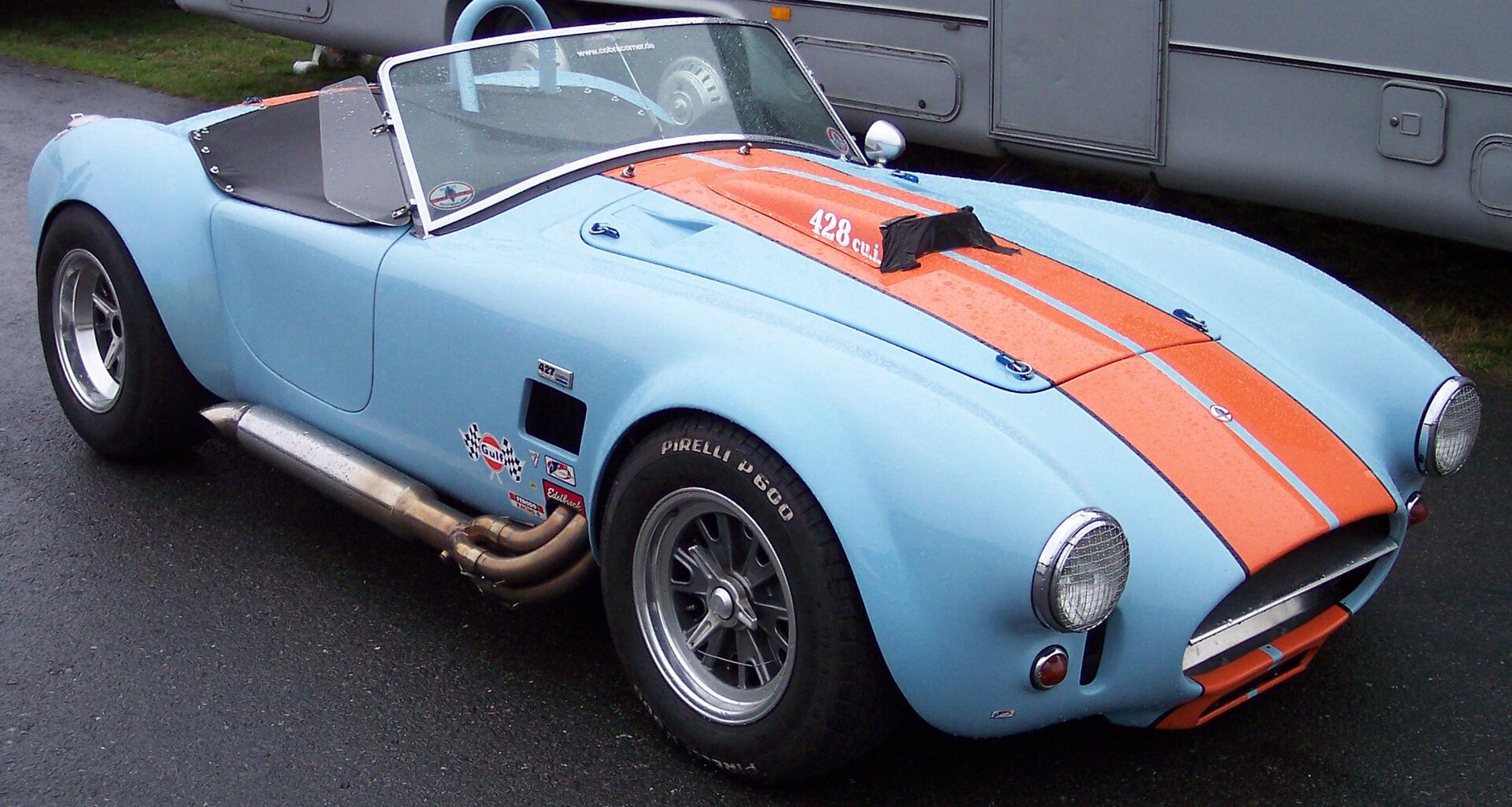 Blue Shelby Cobra 427 roadster, front left view