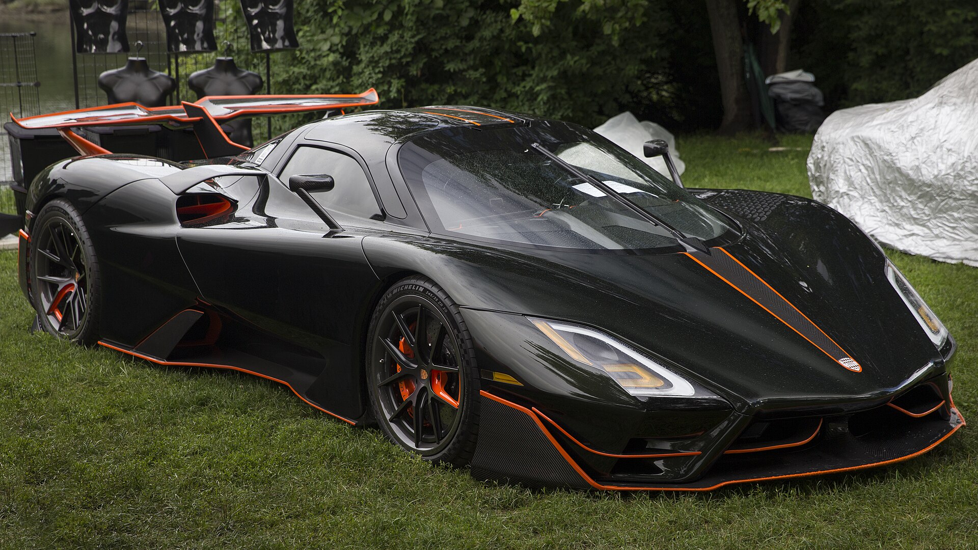 SSC Tuatara Striker in green and orange, front right view